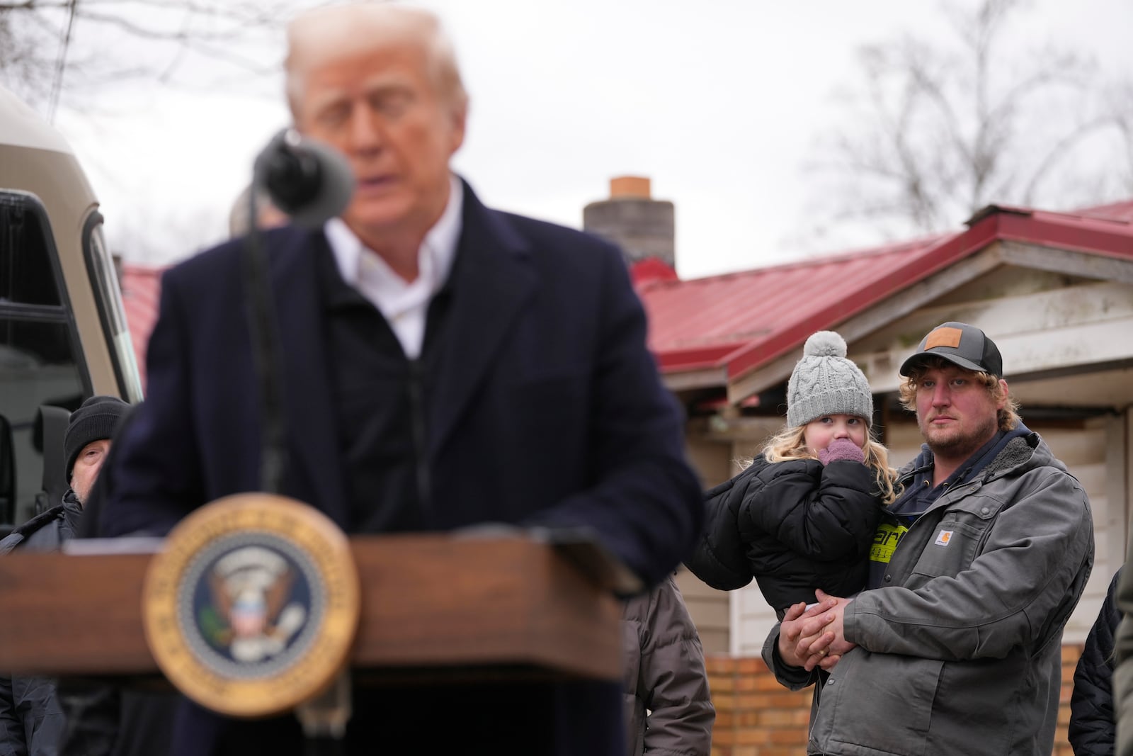 President Donald Trump speaks as he meets with homeowners affected by Hurricane Helene in Swannanoa, N.C., Friday, Jan. 24, 2025. (AP Photo/Mark Schiefelbein)