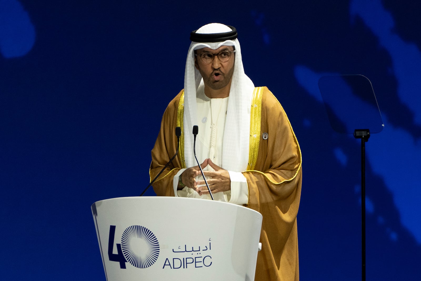 UAE Minister of Industry and Advanced Technology and Managing Director of state-run Abu Dhabi National Oil Co. (ADNOC) Sultan al-Jaber speaks during the inaugural session of annual Abu Dhabi International Petroleum Exhibition and Conference (ADIPEC) in Abu Dhabi, United Arab Emirates, Monday, Nov. 4, 2024. (AP Photo/Altaf Qadri)