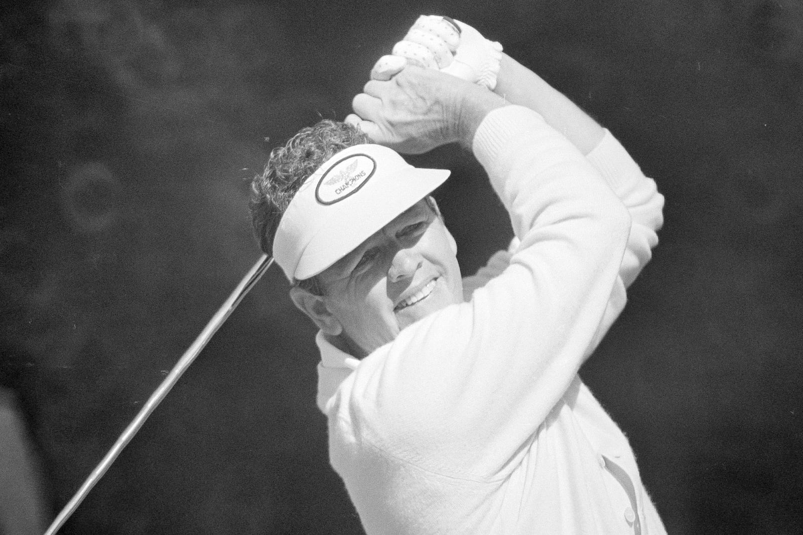 FILE - Former Masters champ Jack Burke tees off during a practice rounds at the Augusta National Golf Club in Augusta, Ga., April 11, 1974. (AP Photo/Paul Vathis, File)