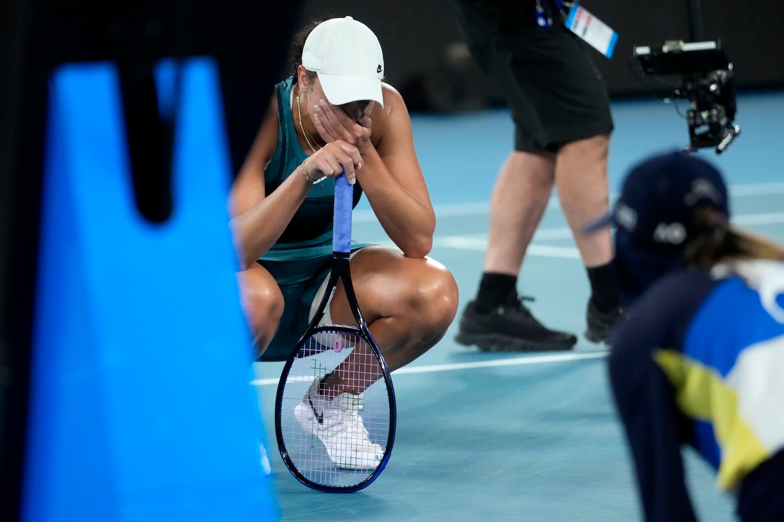 Madison Keys of the U.S. reacts after defeating Iga Swiatek of Poland in their semifinal match at the Australian Open tennis championship in Melbourne, Australia, early Friday, Jan. 24, 2025. (AP Photo/Asanka Brendon Ratnayake)