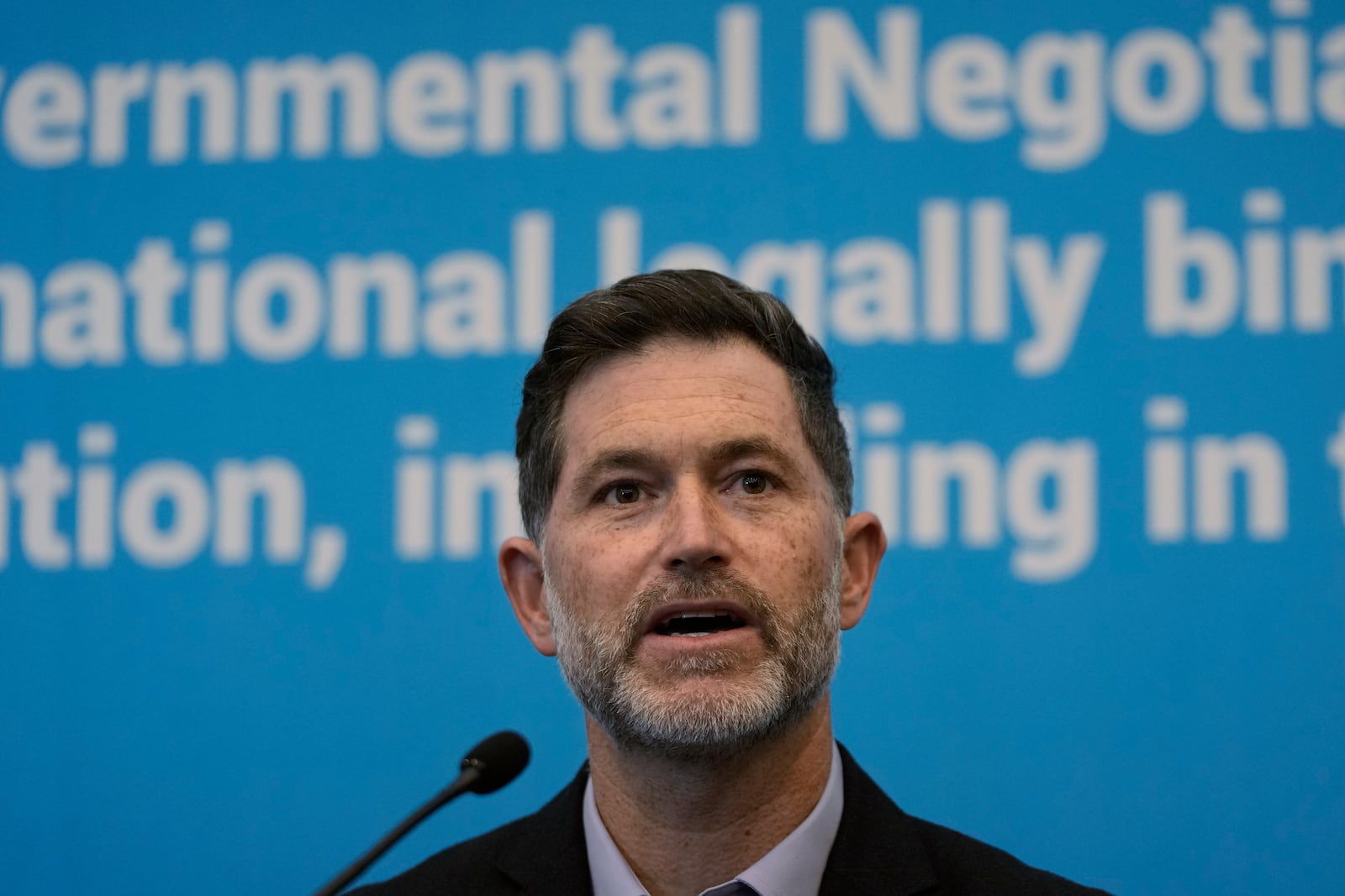 Graham Forbes, Greenpeace Head of Delegation to the Global Plastics Treaty Negotiations, speaks during a press conference at the fifth session of the Intergovernmental Negotiating Committee on Plastic Pollution in Busan, South Korea, Saturday, Nov. 30, 2024. (AP Photo/Ahn Young-joon)