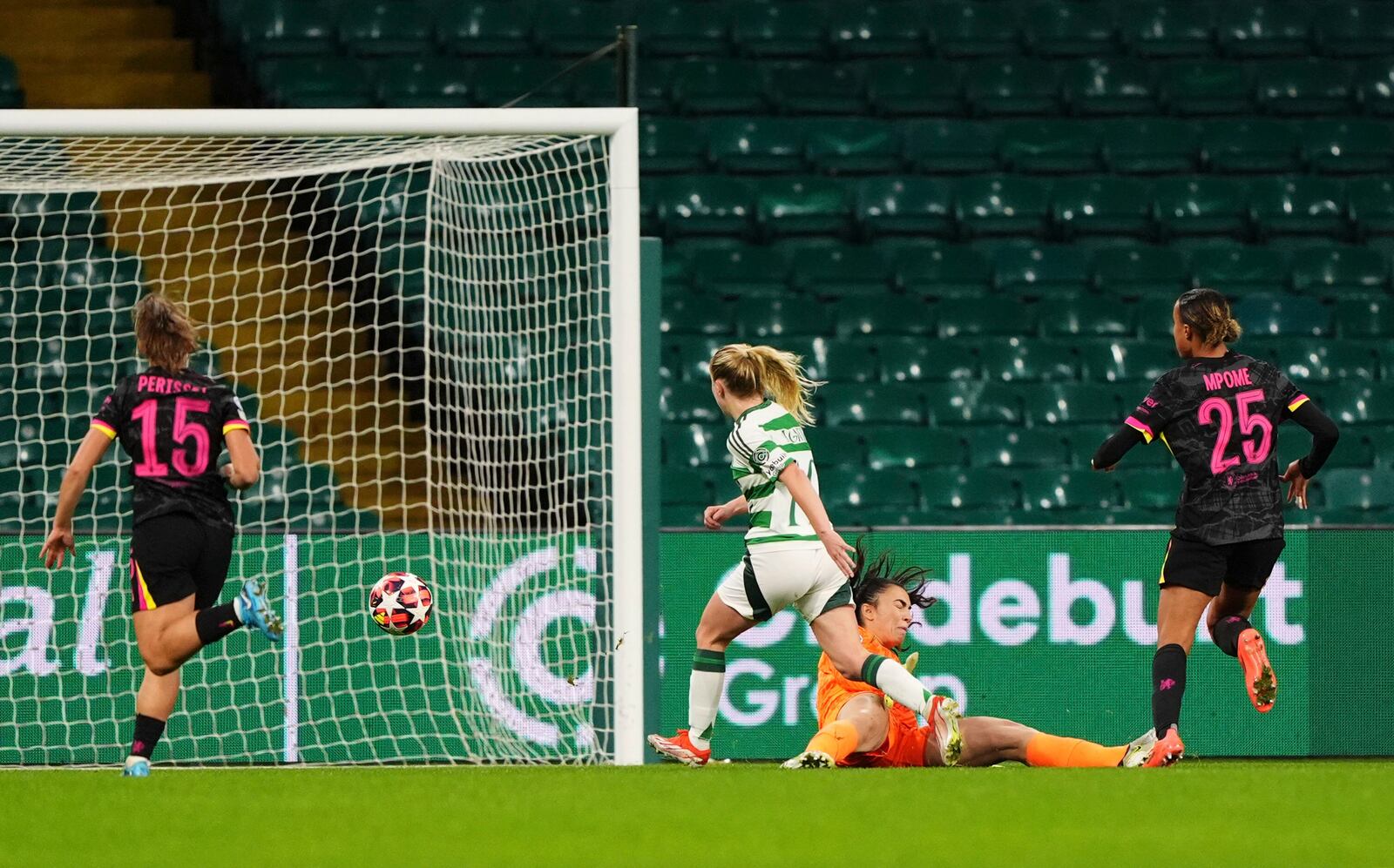 Celtic's Murphy Agnew, center, scores her side's first goal of the game, during the Women's Champions League, group B soccer match between Celtic Women and Chelsea Women, at Celtic Park, Glasgow, Scotland, Wednesday Nov. 13, 2024. (Andrew Milligan/PA via AP)