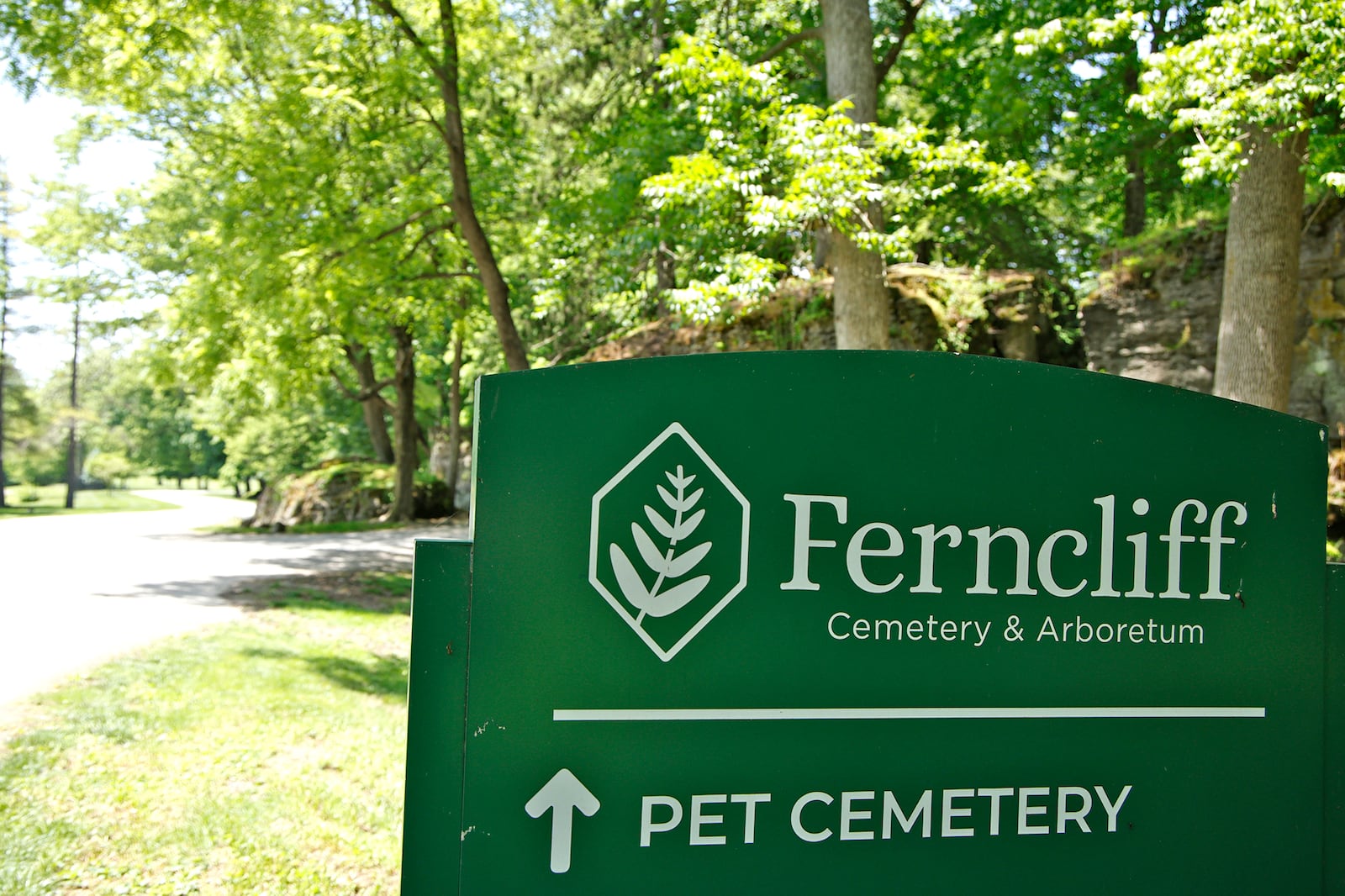 A direction sign at Ferncliff Cemetery and Arboretum directs people to the pet cemetery section. BILL LACKEY/STAFF