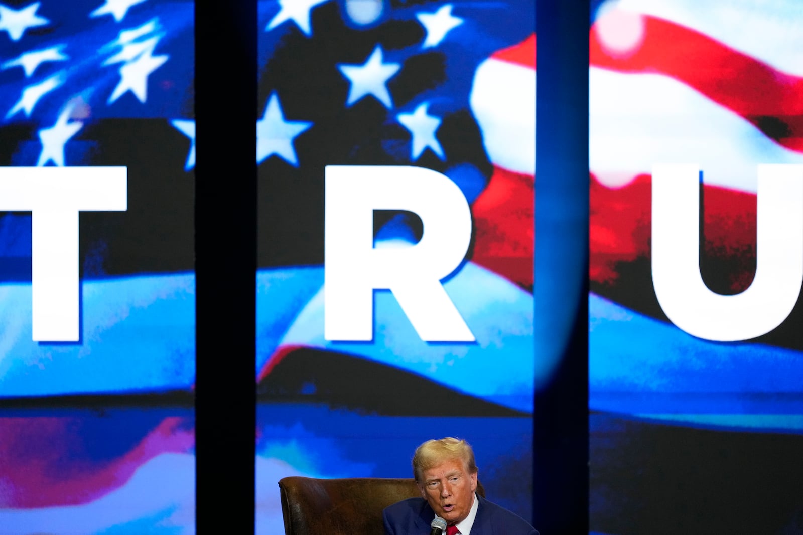 Republican presidential nominee former President Donald Trump speaks during a faith town hall with Georgia Lt. Gov. Burt Jones at Christ Chapel Zebulon, Wednesday, Oct. 23, 2024, in Zebulon, Ga. (AP Photo/Julia Demaree Nikhinson)