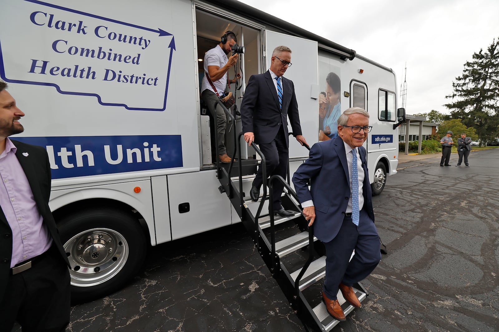 Governor Mike DeWine steps out of the new  Mobile Health Unit, which the state is letting the Clark County Combined Health District use Thursday, Sept. 26, 2024. BILL LACKEY/STAFF