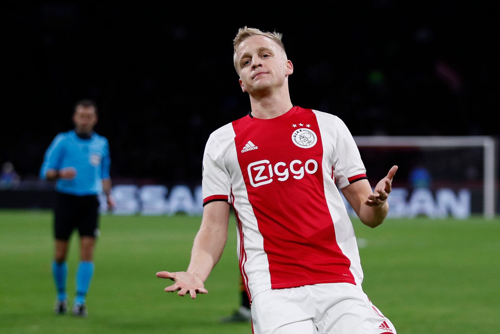 FILE - In this Tuesday, Dec. 10, 2019 file photo, Ajax's Donny van de Beek reacts as a pass for him went out during the group H Champions League soccer match between Ajax and Valencia at the Johan Cruyff ArenA in Amsterdam, Netherlands. Premier League clubs have been busy in the transfer market in an unusually short offseason because of pandemic-induced late finish to last season. Donny Van de Beek will strengthen the squad of Manchester United. (AP Photo/Peter Dejong, File)