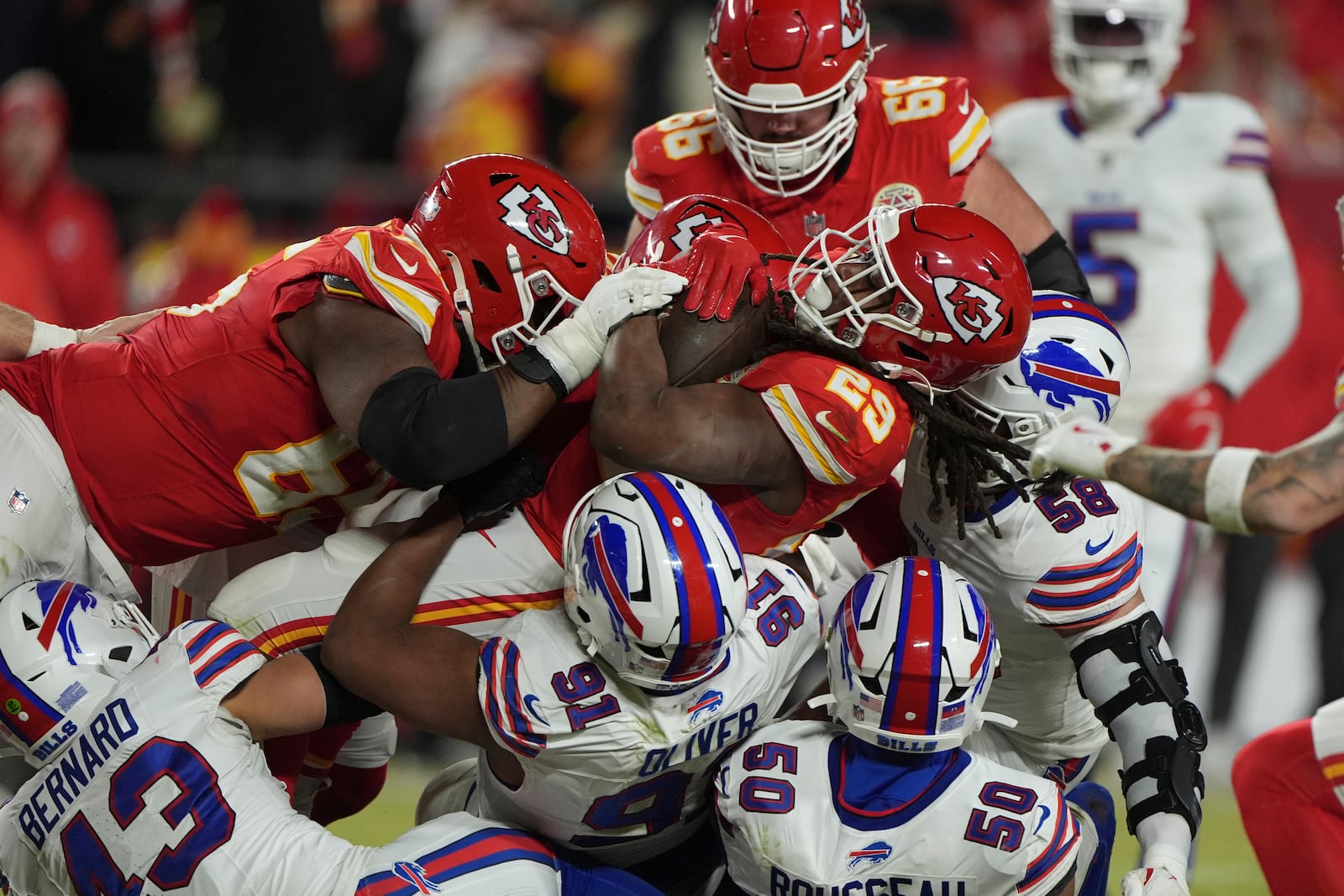 Kansas City Chiefs running back Kareem Hunt (29) struggles for yardage during the first half of the AFC Championship NFL football game against the Buffalo Bills, Sunday, Jan. 26, 2025, in Kansas City, Mo. (AP Photo/Charlie Riedel)