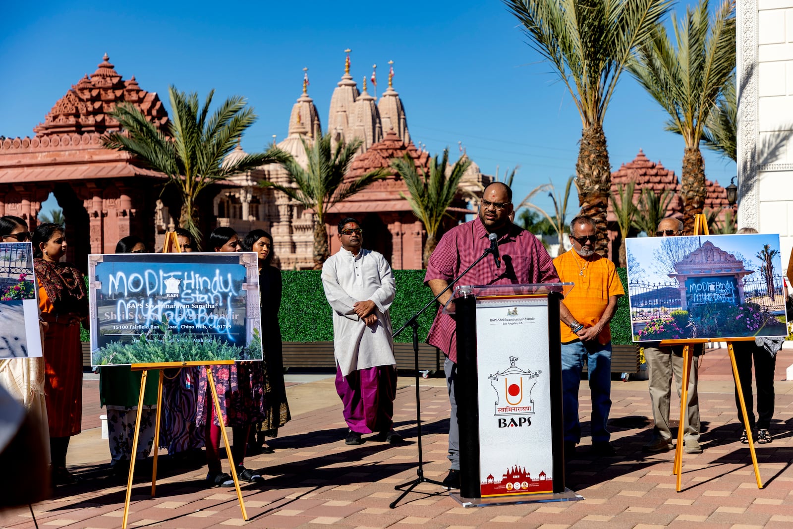 Mehul Patel, a volunteer with BAPS Shri Swaminarayan Mandir, a Hindu temple in Chino Hills, Calif., speaks during a rally for unity and peace on Sunday, March 9, 2025, after the temple was desecrated with graffiti March 7, 2025. (BAPS Swaminarayan Sanstha via AP)