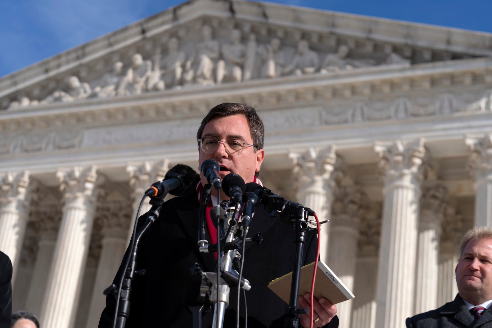 Tennessee Attorney General Jonathan Skrmetti talks to reporters outside of the Supreme Court, Wednesday, Dec. 4, 2024, in Washington. (AP Photo/Jose Luis Magana)