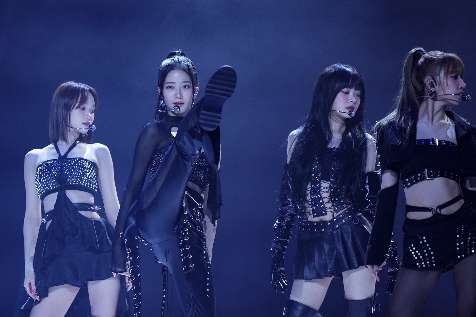 Kim Chaewon, from left, Kazuha, Hong Eunchae and Sakura Miyawaki from the group 'Le Sserafim' perform during the MTV European Music Awards in Manchester, England, Sunday, Nov. 10, 2024. (Scott A Garfitt/Invision/AP)