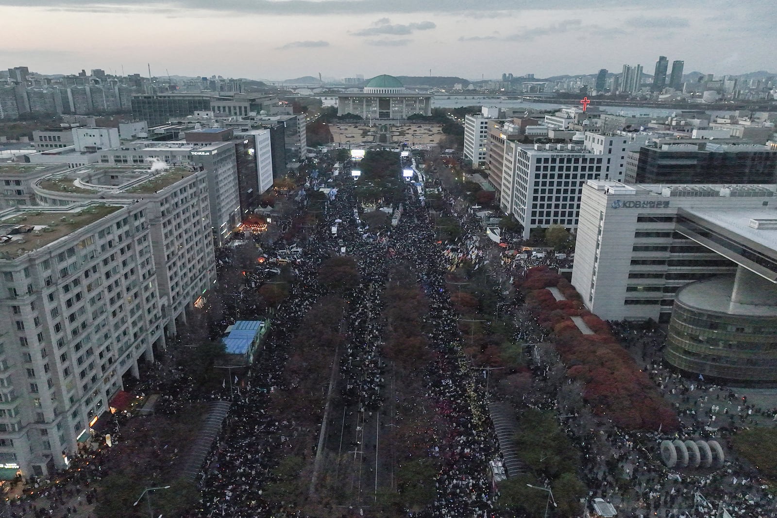 Protesters stage a rally demanding South Korean President Yoon Suk Yeol's impeachment following the president's short-lived martial law declaration in front of the National Assembly in Seoul, South Korea, Saturday, Dec. 7, 2024. (Seo Dae-yeon/Yonhap via AP)