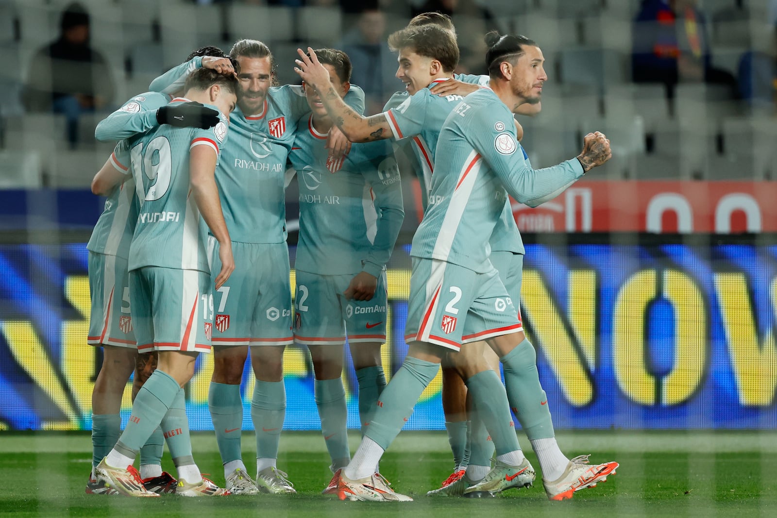 Atletico Madrid players celebrate after a goal during a Spanish Copa del Rey, or King's Cup, the semi-final soccer match between Barcelona and Atletico Madrid in Barcelona, Spain, Tuesday, Feb. 25, 2025. AP Photo/Joan Monfort)