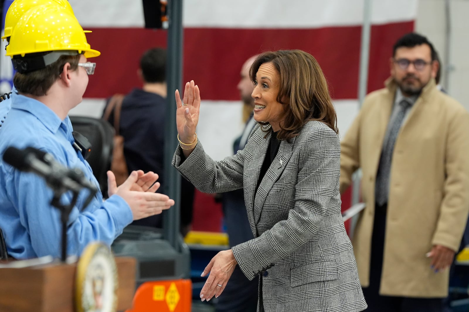 Democratic presidential nominee Vice President Kamala Harris greets employees after speaking at the Hemlock Semiconductor Next-Generation Finishing facility in Hemlock, Mich., Monday, Oct. 28, 2024. (AP Photo/Jacquelyn Martin)