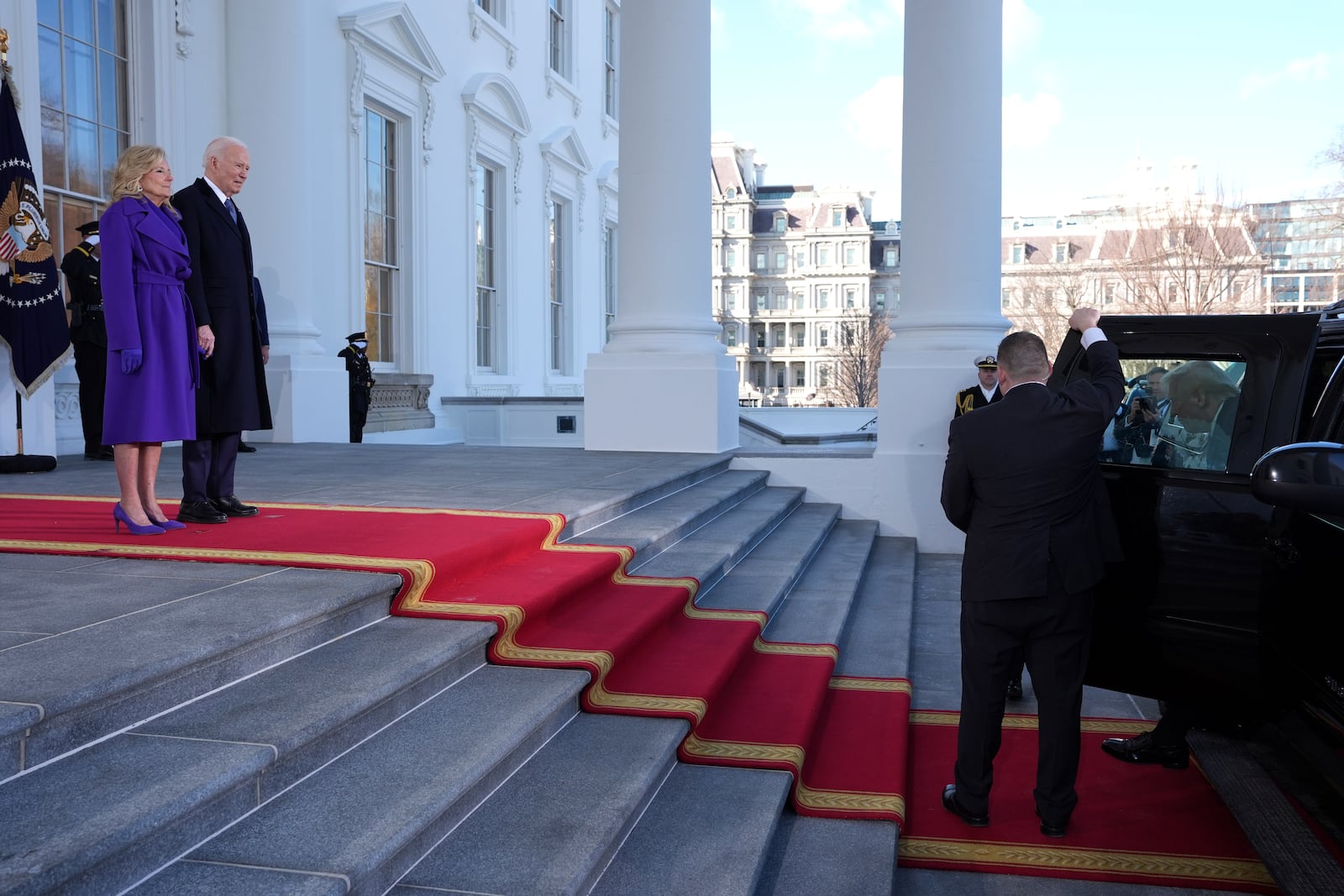 President Joe Biden, second left, and first lady Jill Biden, left, greet President-elect Donald Trump upon arriving at the White House, Monday, Jan. 20, 2025, in Washington. (AP Photo/Evan Vucci)