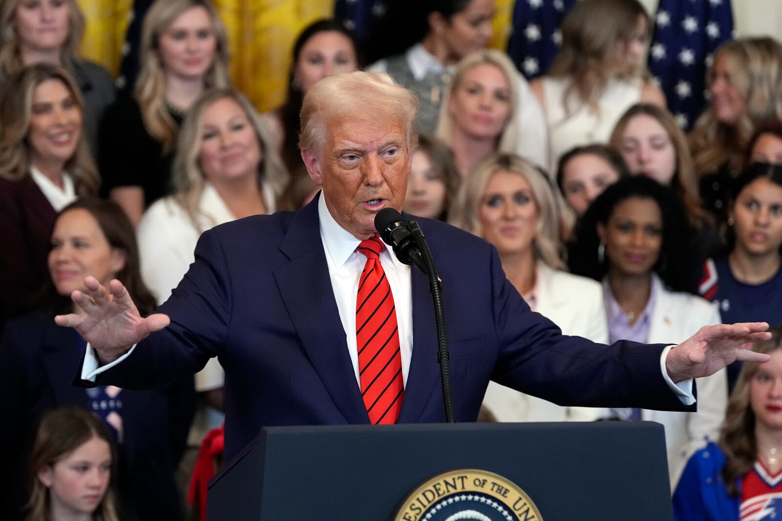 President Donald Trump speaks before signing an executive order barring transgender female athletes from competing in women's or girls' sporting events, in the East Room of the White House, Wednesday, Feb. 5, 2025, in Washington. (AP Photo/Alex Brandon)