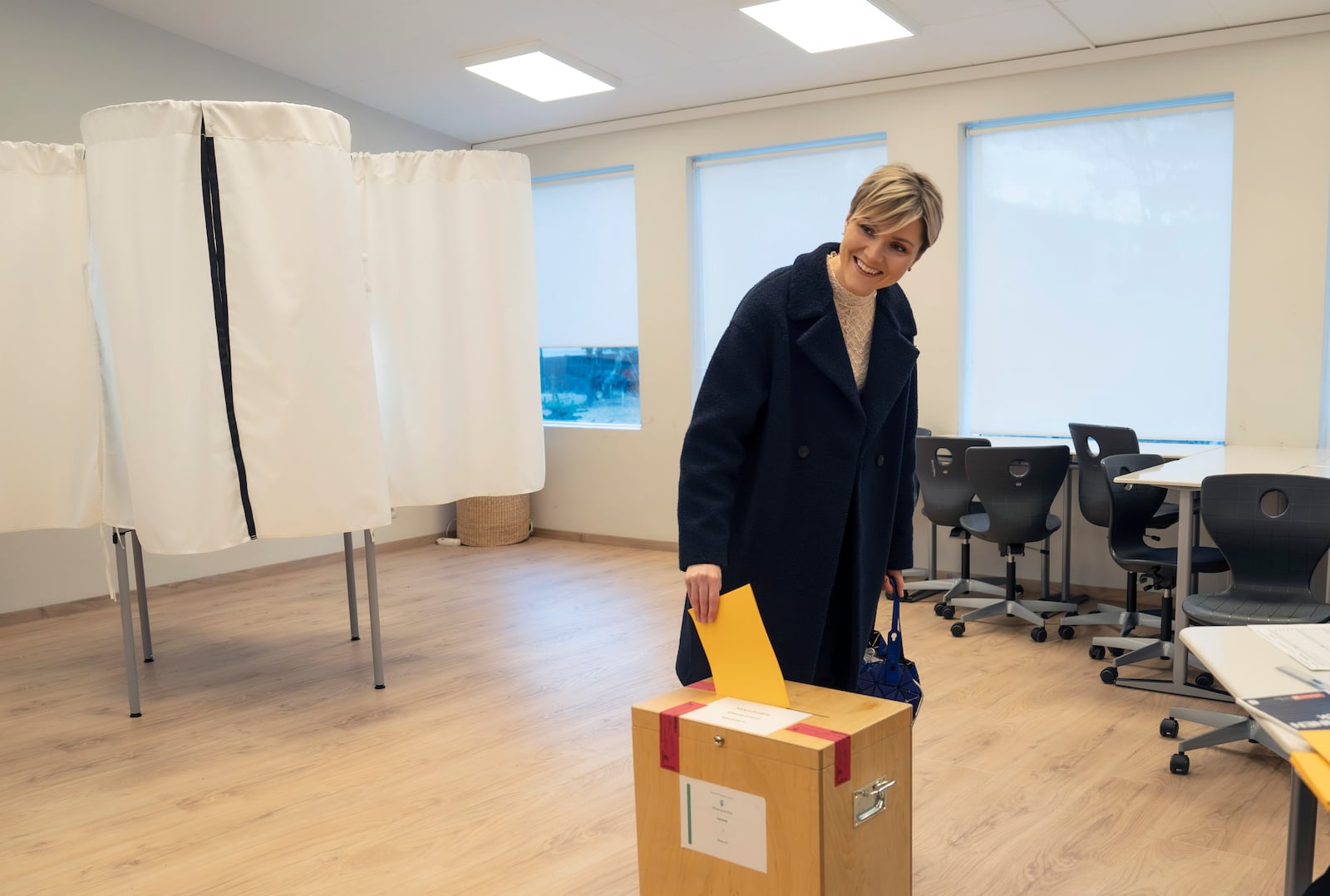 Kristrún Mjöll Frostadóttir, leader of Iceland's Social Democrats Party (Samfylkingin) casts her ballot at a polling station, in Reykjavik, Saturday, Nov. 30, 2024. (AP Photo/Marco Di Marco)