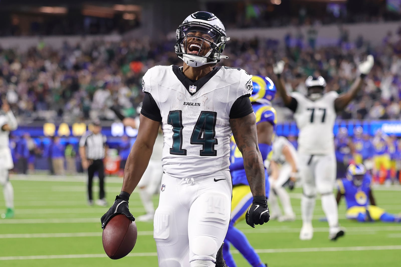 Philadelphia Eagles running back Kenneth Gainwell (14) reacts after scoring against the Los Angeles Rams during the second half of an NFL football game in Inglewood, Calif., Sunday, Nov. 24, 2024. (AP Photo/Ryan Sun)