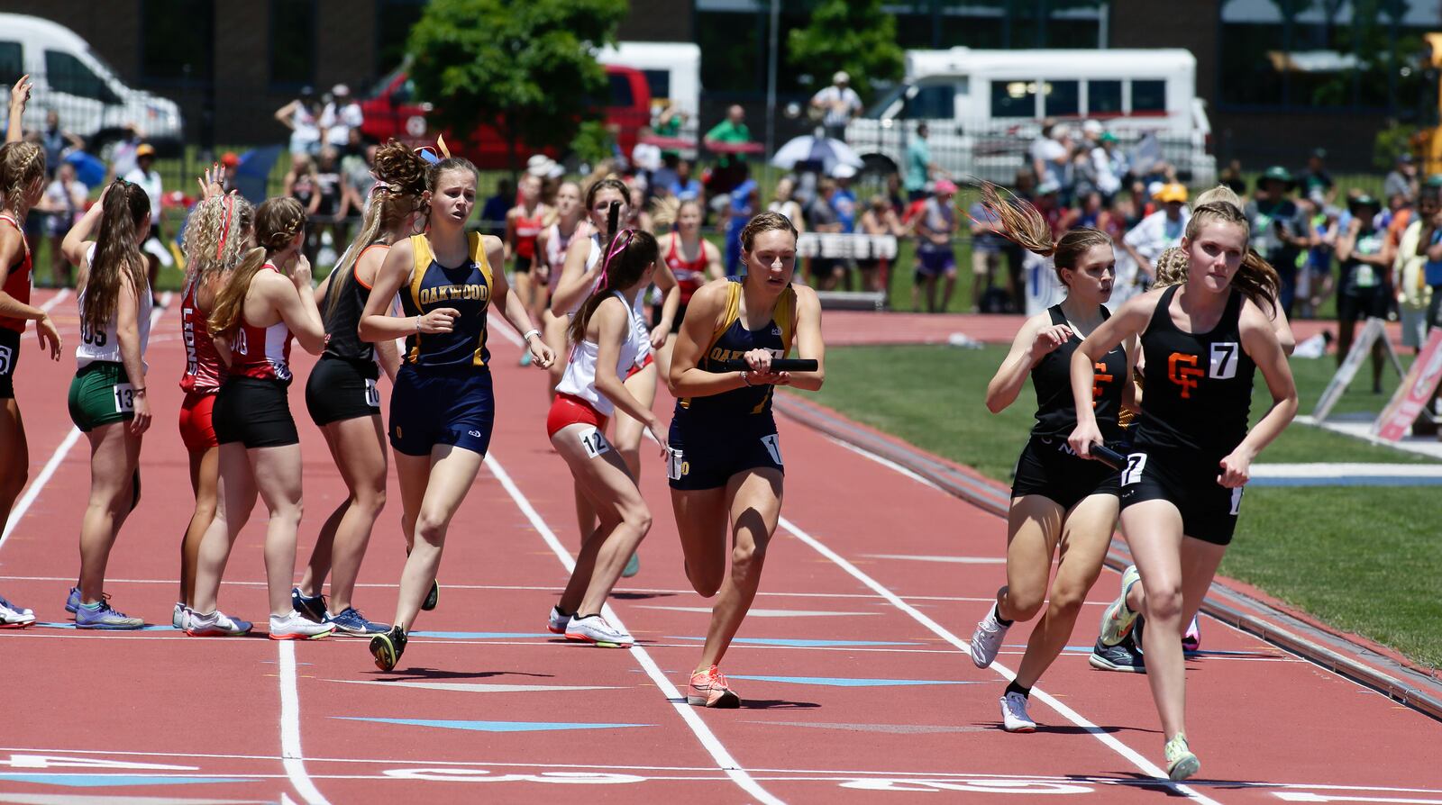 Oakwood's Grace Hartman starts the final leg of the 4x800-meter relay on Friday, June 3, 2022, in the Division II state track and field championships at Jesse Owens Memorial Stadium in Columbus. Oakwood on the race for the second straight year. David Jablonski/Staff