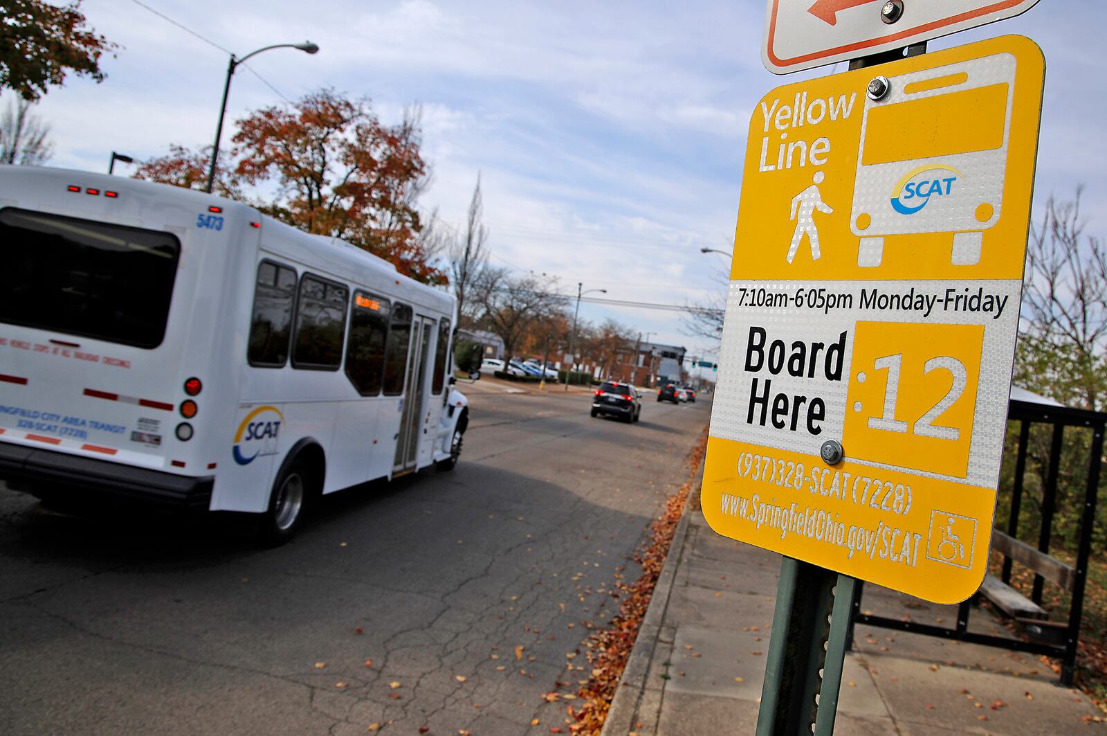 A SCAT bus drives past a bus stop along West Main Street in Springfield Monday, Nov. 6, 2023. BILL LACKEY/STAFF