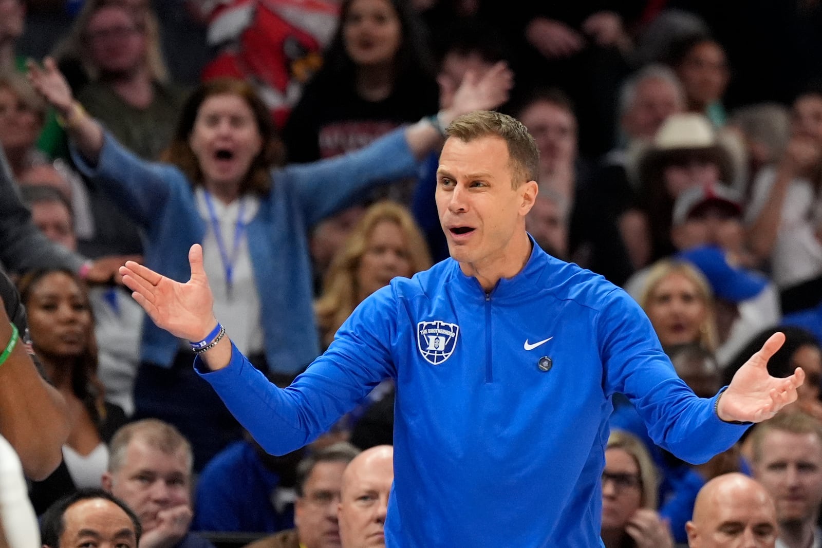 Duke head coach Jon Scheyer reacts during the first half of an NCAA college basketball game against Louisville in the championship of the Atlantic Coast Conference tournament, Saturday, March 15, 2025, in Charlotte, N.C. (AP Photo/Chris Carlson)