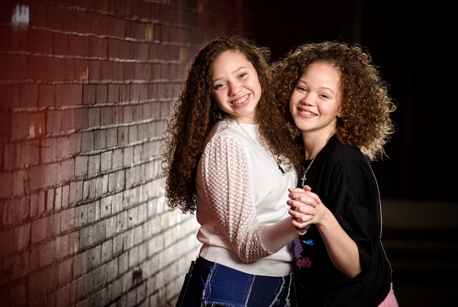 The Cunningham sisters, Macie, 15, left, and Marie, 13, have been singing on social media trying to spread a positive message and recently sent an audition video to the television show The Voice. NICK GRAHAM / STAFF