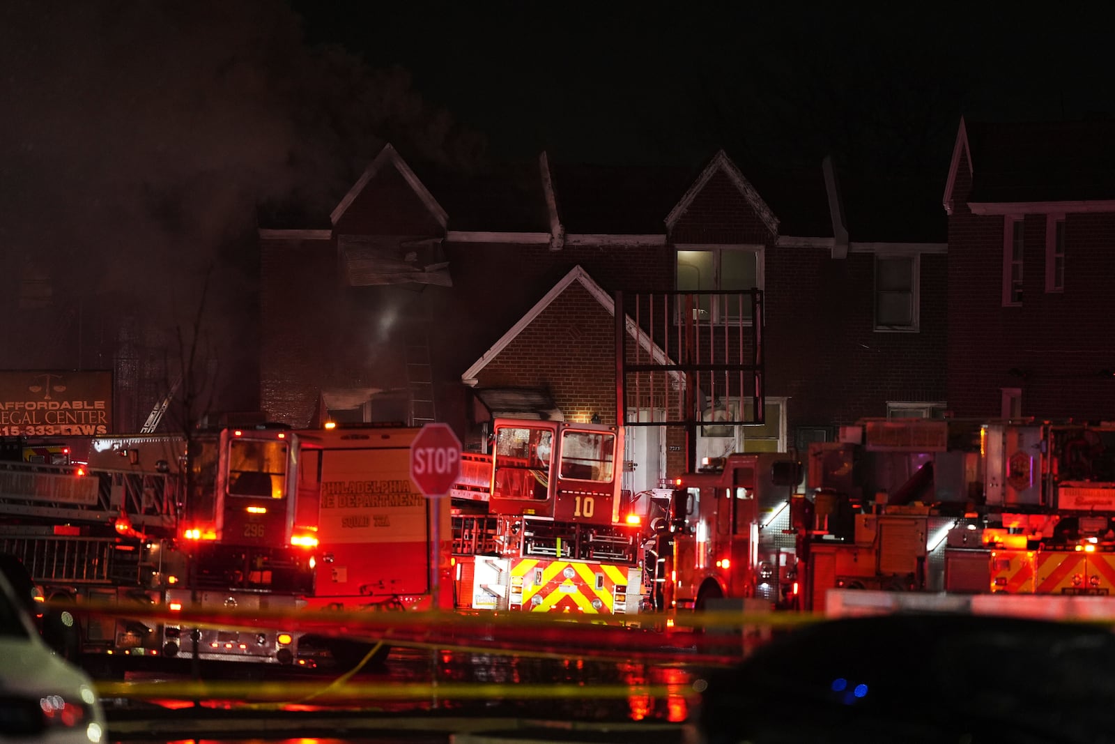 First responders work the scene after what witnesses say was a plane crash in Philadelphia, Friday, Jan. 31, 2025. (AP Photo/Matt Rourke)