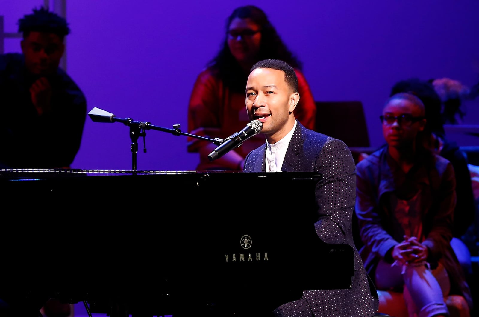 John Legend performs on stage during a concert following the ribbon cutting for the new John Legend Theater Sunday. Bill Lackey/Staff