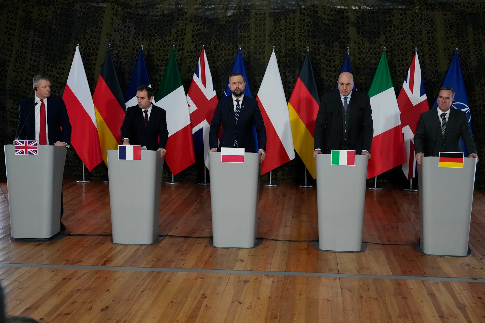 From left: Luke Pollard, Parliamentary Under-Secretary of State in the Britain's Ministry of Defence, France's Minister of the Armed Forces Sebastien Lecornu, Poland's Minister of National Defence Wladyslaw Kosiniak-Kamysz, Italy's Minister of Defence Guido Crosetto, and Germany's Federal Minister of Defence Boris Pistorius attend a news conference after a meeting of defense ministers of five NATO countries to discuss coordinating their defense plans and support for Ukraine, in the village of Helenow, near Warsaw, Poland, Monday, Jan. 13, 2025. (AP Photo/Czarek Sokolowski)