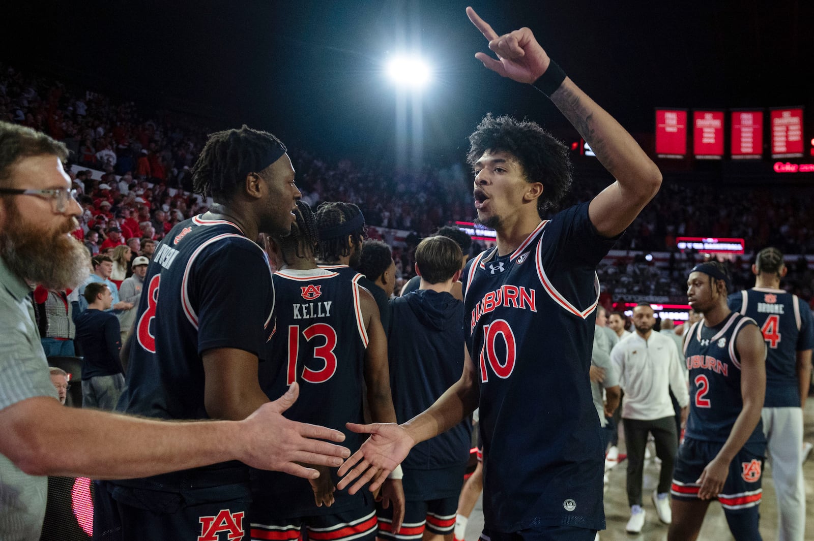 Auburn guard Chad Baker-Mazara (10) celebrates after an NCAA college basketball game against Georgia, Saturday, Jan. 18, 2025, in Athens, Ga. (AP Photo/Kathryn Skeean)