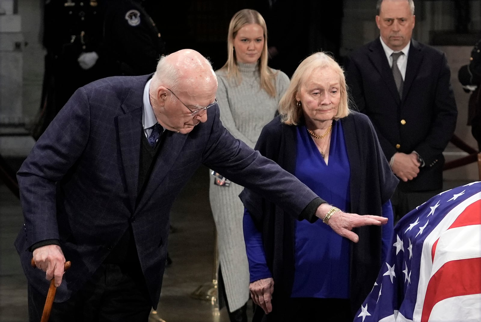 Former Sen. Patrick Leahy and his wife Marcelle pause at the flag-draped casket of former President Jimmy Carter as he lies in state in the rotunda of the U.S. Capitol in Washington, Wednesday, Jan. 8, 2025. (AP Photo/J. Scott Applewhite)