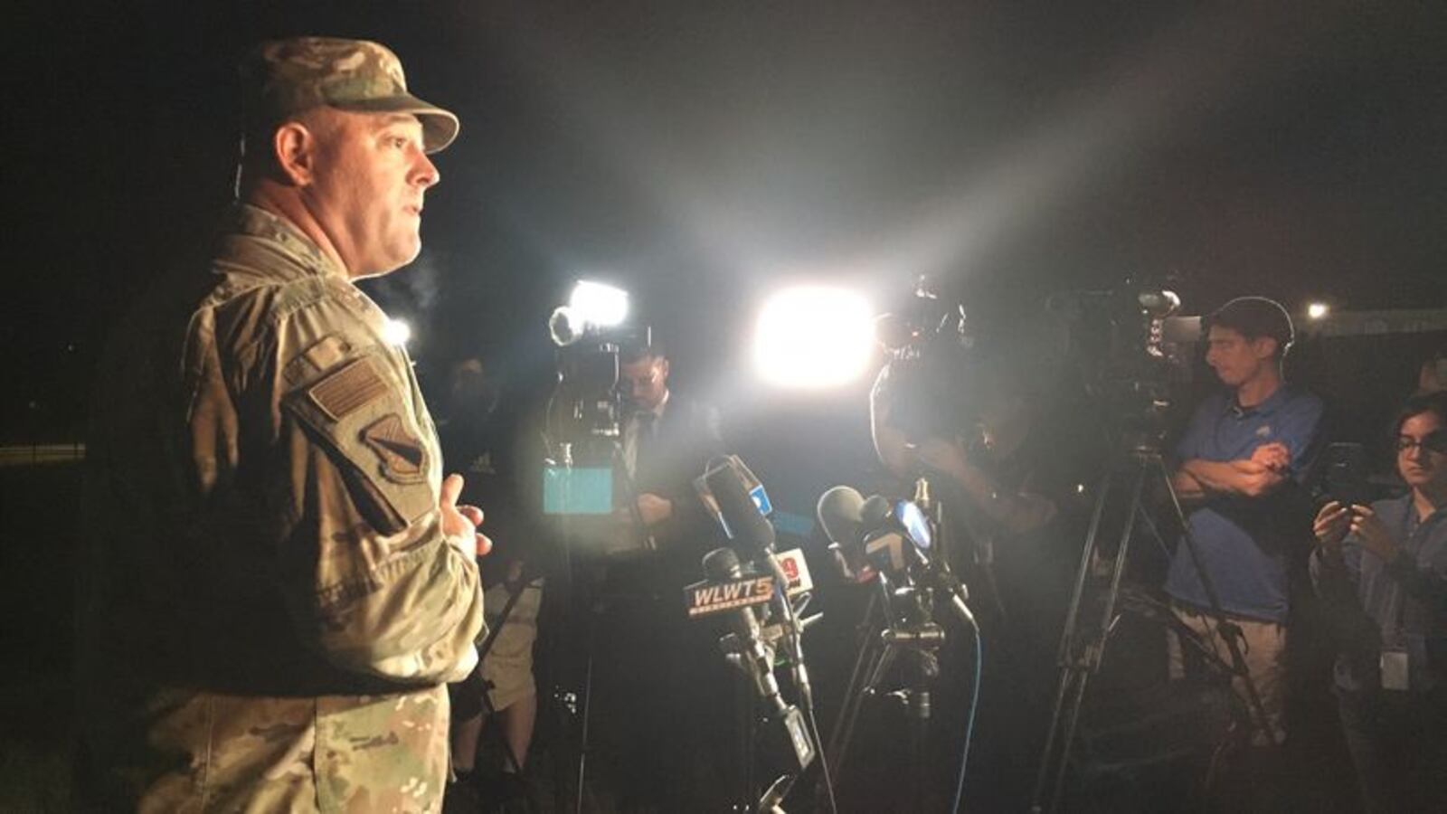 Col. Patrick MIller, commander of the 88th Air Base Wing at Wright-Patterson Air Force Base, addresses the media in a 2 a.m. press conference Sept. 10, 2021 outside the Hope Hotel. A four-hour investigation found no active shooter on the base after an initial report. THOMAS GNAU/STAFF