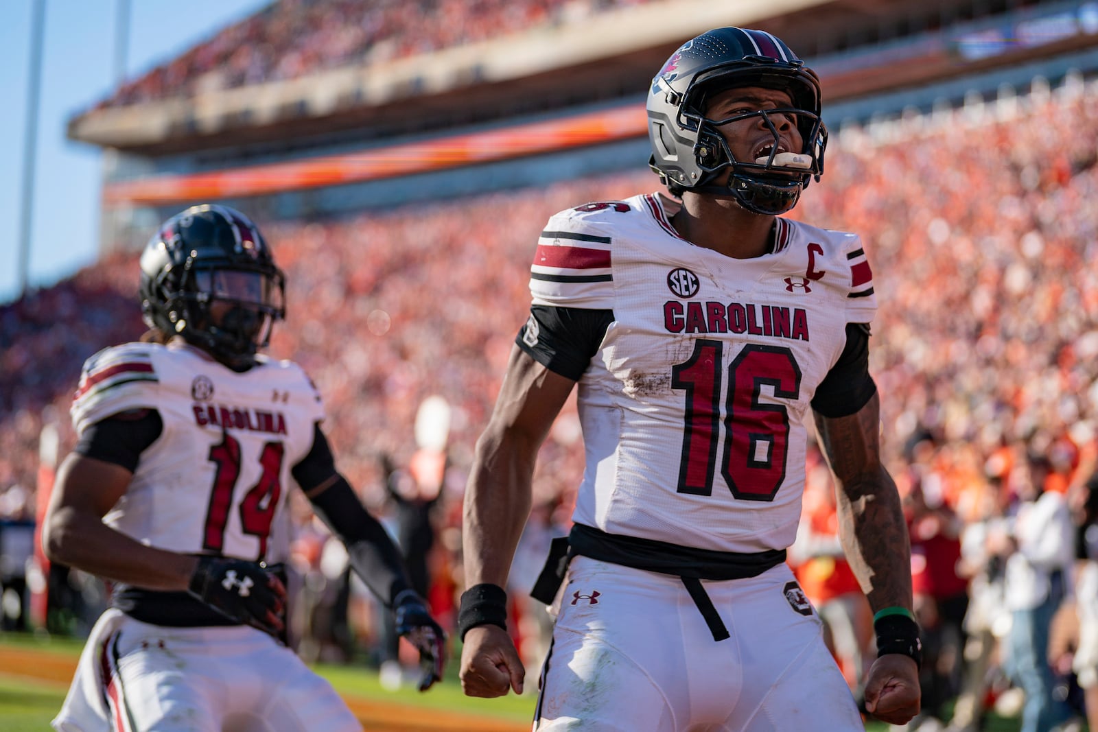 South Carolina quarterback LaNorris Sellers (16) reacts after scoring a touchdown in the second half of an NCAA college football game against Clemson, Saturday, Nov. 30, 2024, in Clemson, S.C. (AP Photo/Jacob Kupferman)