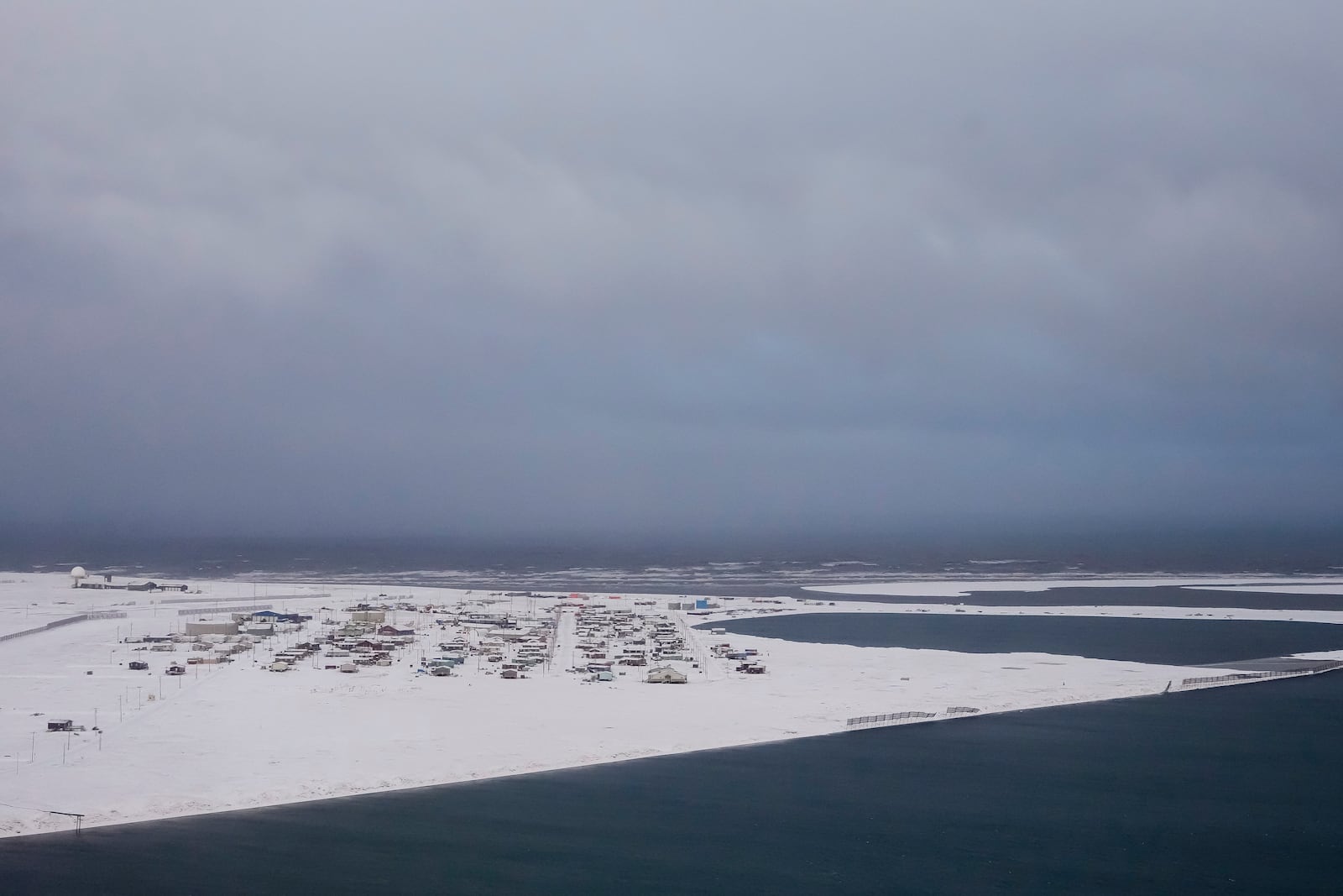 The village of Kaktovik is seen at the edge of Barter Island in the Arctic National Wildlife Refuge, near Kaktovik, Alaska, Monday, Oct. 14, 2024. (AP Photo/Lindsey Wasson)