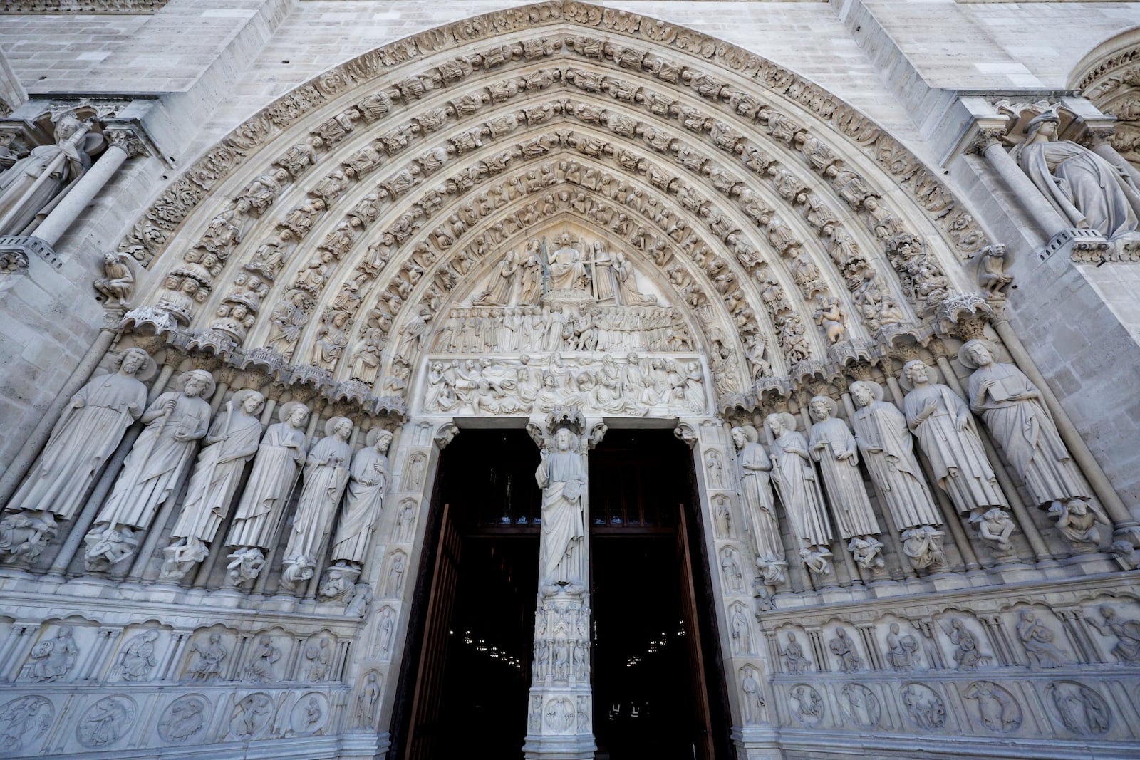 The main entrance of Notre-Dame de Paris cathedral is pictured after French President Emmanuel Macron visited the restored interiors of the monument, Friday Nov. 29, 2024, in Paris. (Stephane de Sakutin, Pool via AP)