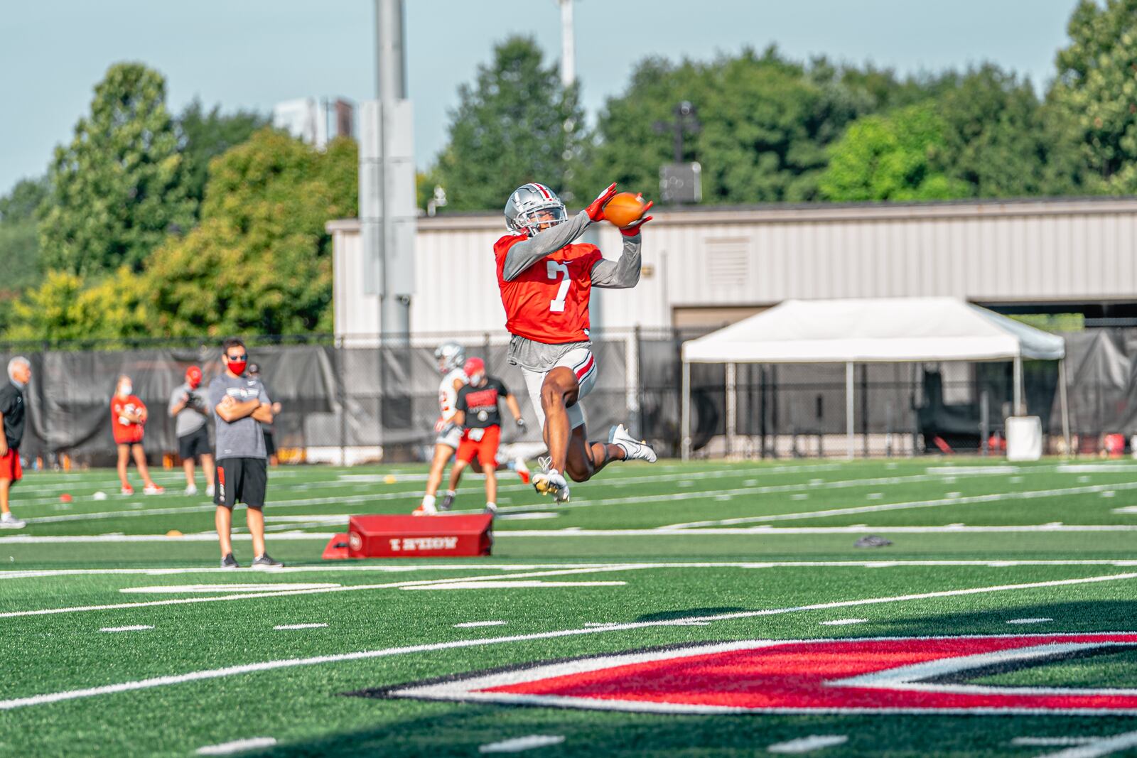 Kamryn Babb catches a pass during Ohio State football practice.