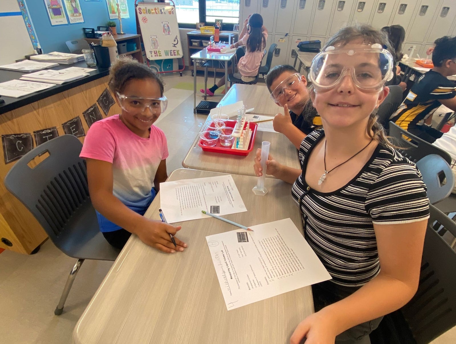 Clark-Shawnee Local School District students work on a science experiment to measure volume of a liquid. Contributed Photo