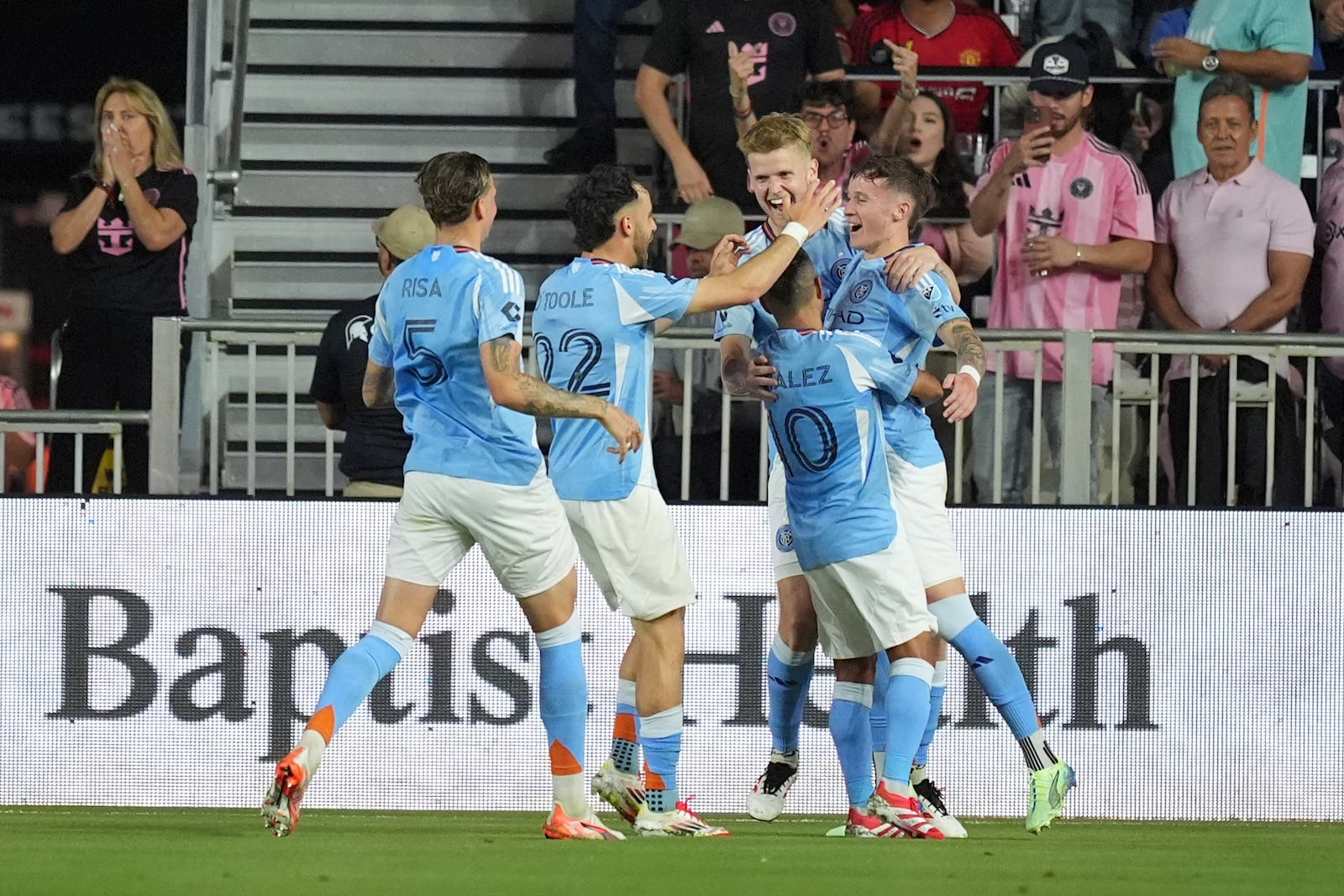 New York City FC players celebrate a goal by New York City FC defender Mitja Ilenic, right, during the first half of an MLS soccer match against Inter Miami, Saturday, Feb. 22, 2025, in Fort Lauderdale, Fla. (AP Photo/Rebecca Blackwell)