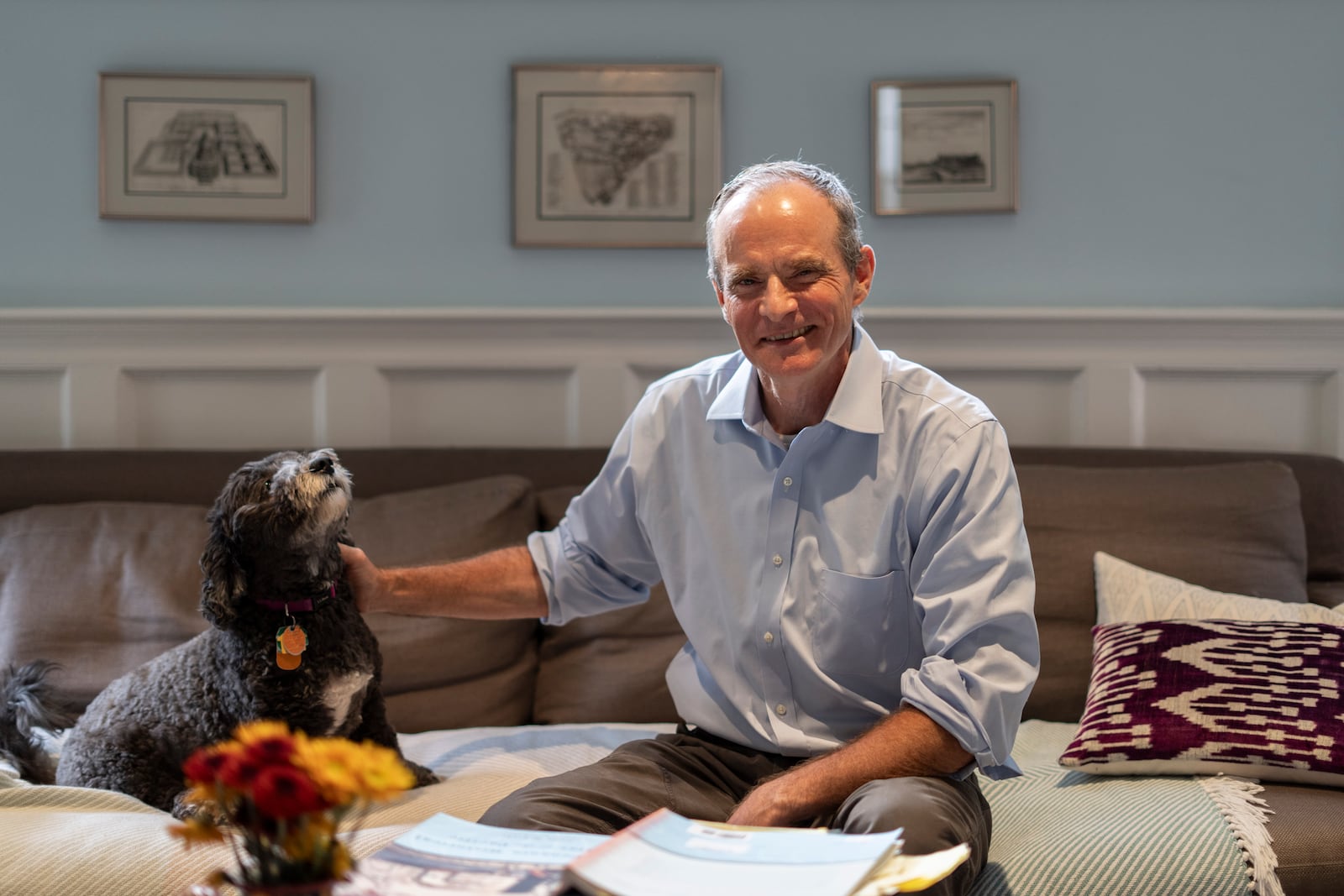 Economist Simon Johnson poses for a photograph after jointly winning the Nobel memorial prize in economics, at his home in Washington, Monday, Oct. 14, 2024. (AP Photo/Ben Curtis)