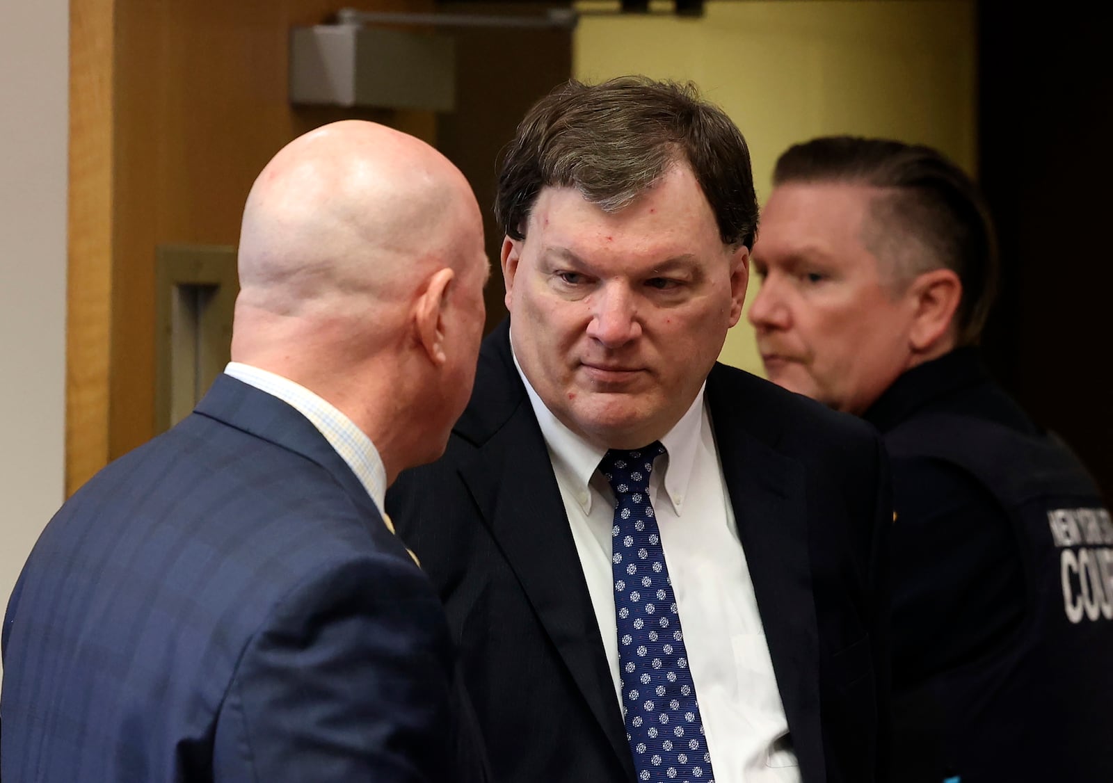 Rex A. Heuermann speaks with his lawyer Michael Brown during a court hearing where he was indicted for the killing of Valerie Mack, inside Supreme Court Justice Timothy Mazzei's courtroom at Suffolk County Court in Riverhead, N.Y. on Tuesday, Dec. 17, 2024. (James Carbone/Newsday via AP, Pool)