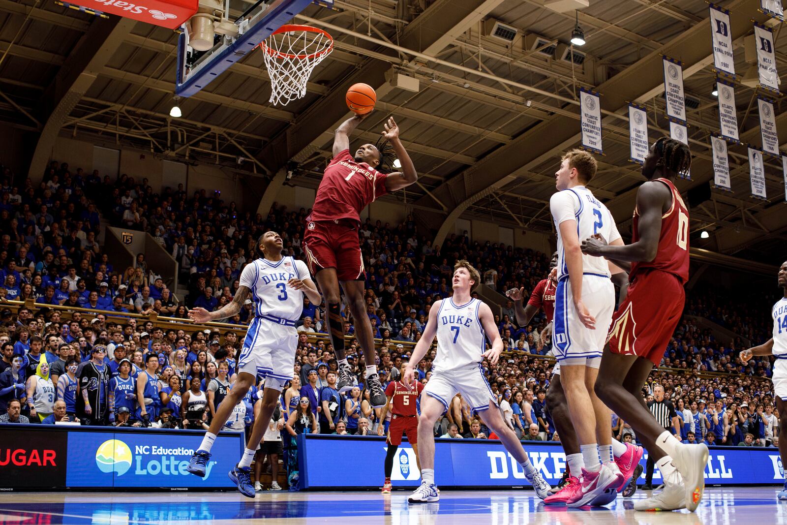 Florida State's Jamir Watkins (1) dunks during the first half of an NCAA college basketball game against Duke in Durham, N.C., Saturday, Mar. 1, 2025. (AP Photo/Ben McKeown)