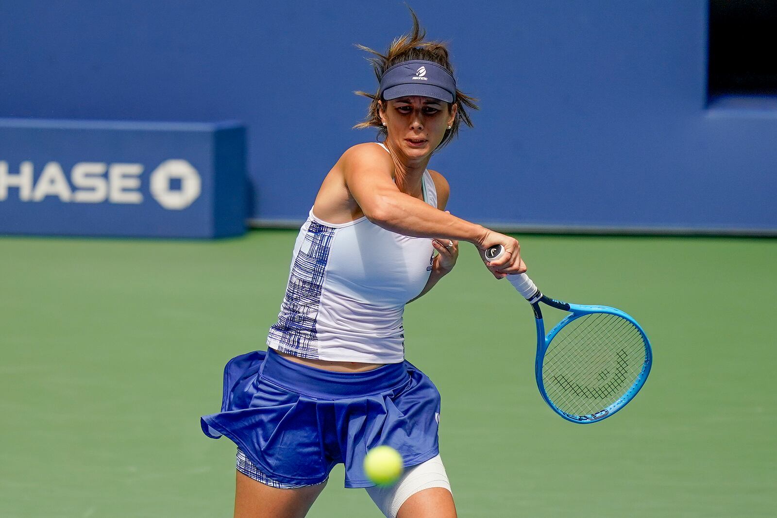 Tsvetana Pironkova, of Bulgaria, returns a shot to Serena Williams, of the United States, during the quarterfinals of the US Open tennis championships, Wednesday, Sept. 9, 2020, in New York. (AP Photo/Seth Wenig)