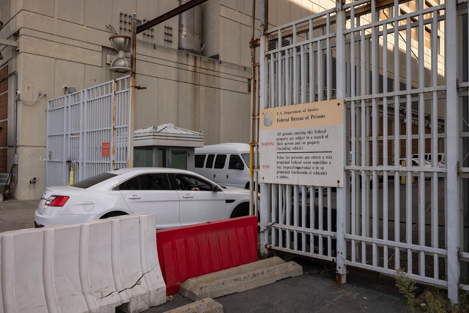 FILE - A car drives into the Metropolitan Detention Center in the Sunset Park neighborhood of the Brooklyn borough of New York, Sept. 19, 2024. (AP Photo/Yuki Iwamura, File)