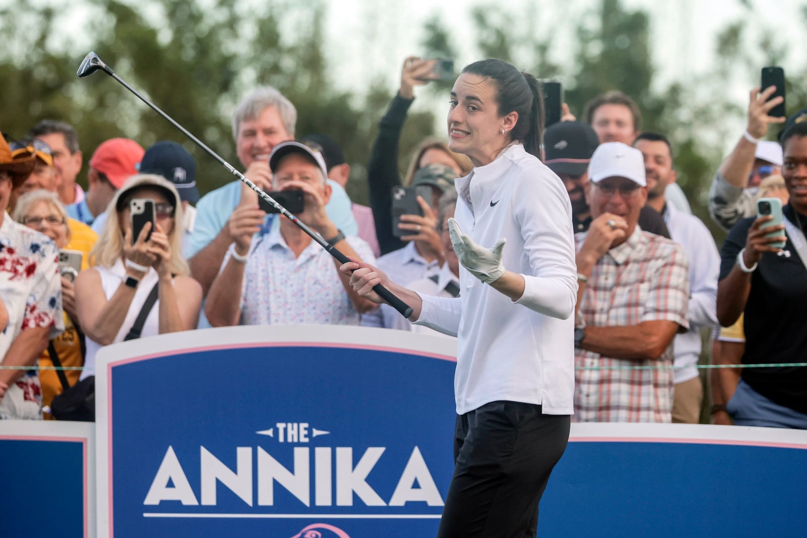 WNBA basketball Caitlin Clark, of the Indiana Fever, shrugs off an errant drive on the third tee during the pro-am at the LPGA Tour golf tournament, Wednesday, Nov 13, 2024, at the Pelican Golf Club in Belleair, Fla. (Douglas R. Clifford/Tampa Bay Times via AP)