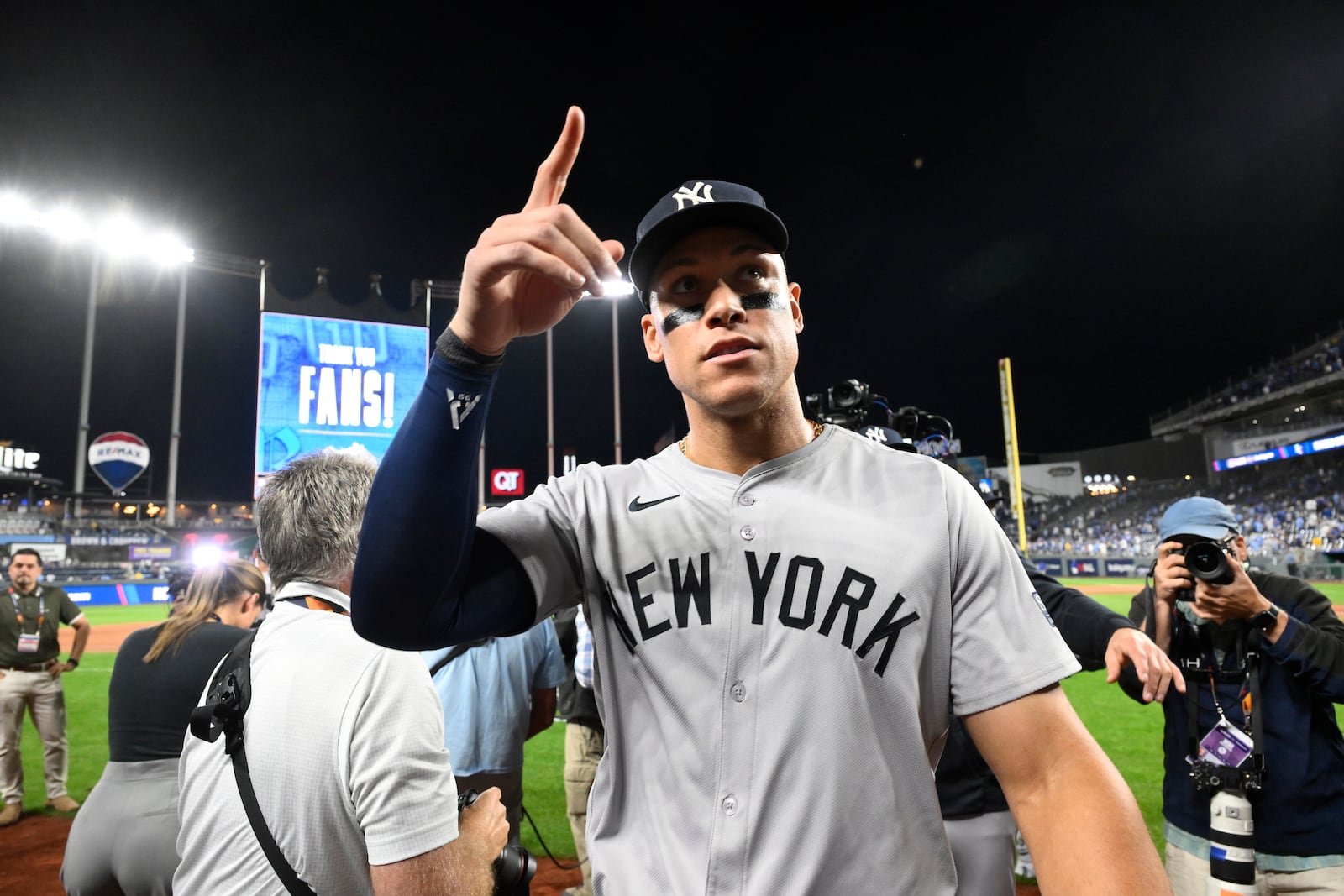 New York Yankees' Aaron Judge celebrates a 3-1 victory over the Kansas City Royals in Game 4 of an American League Division baseball playoff series Thursday, Oct. 10, 2024, in Kansas City, Mo (AP Photo/Reed Hoffmann)