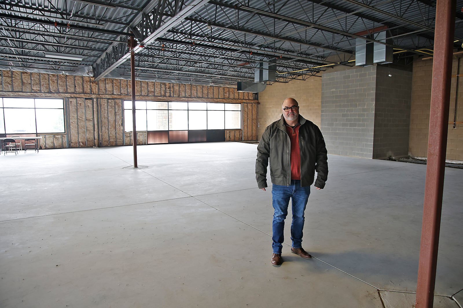 Bill Martino, director of the Clark County Public Library, in the future site of the library's Tuttle Road branch Thursday, March 7, 2024. BILL LACKEY/STAFF