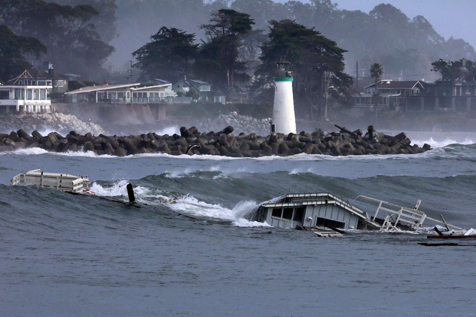 A building floats in the ocean after a wharf partially collapsed Monday, Dec. 23, 2024, in Santa Cruz, Calif. (Shmuel Thaler/The Santa Cruz Sentinel via AP)