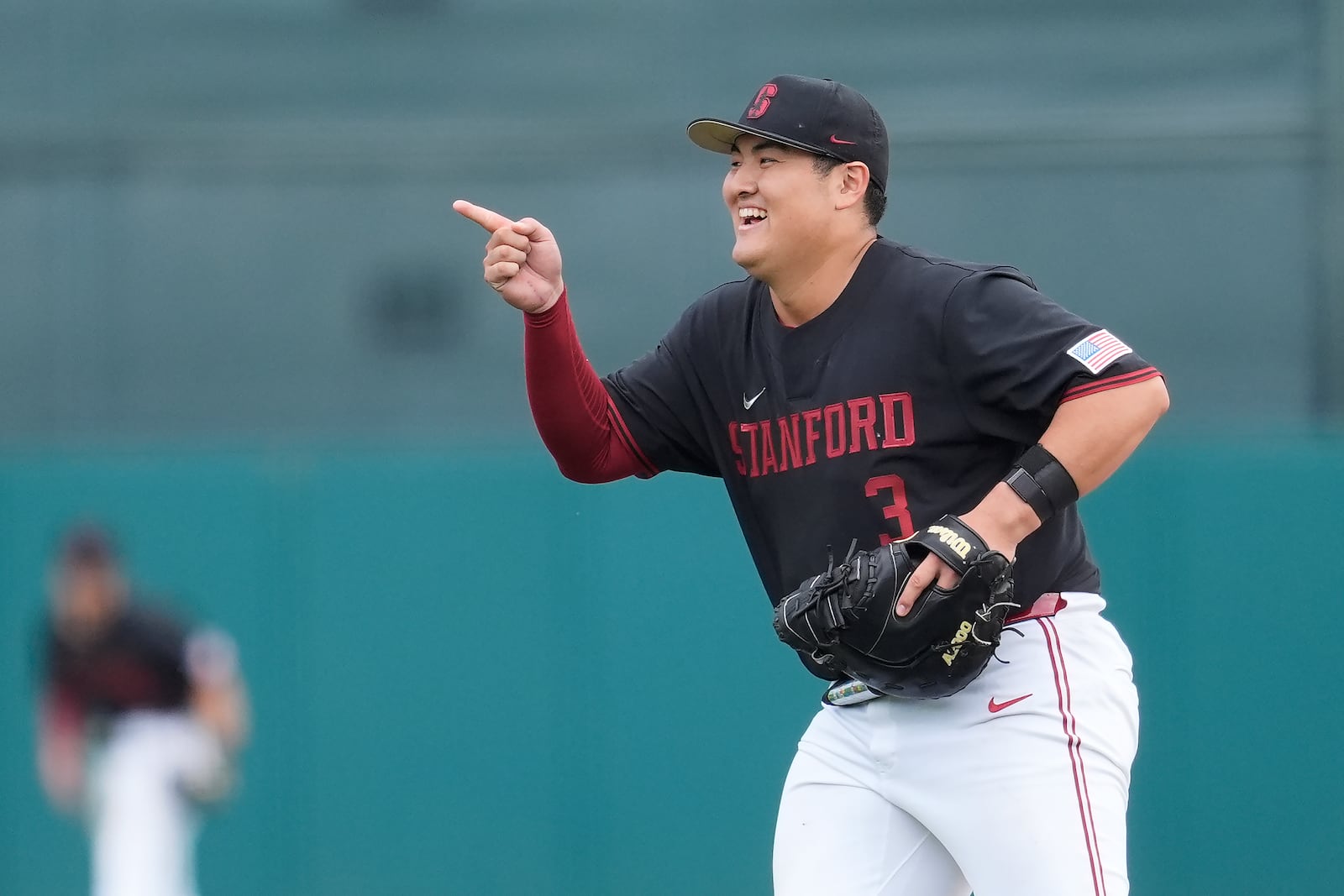 Stanford first baseman Rintaro Sasaki celebrates after an NCAA college baseball game against Washington in Stanford, Calif., Monday, Feb. 24, 2025. (AP Photo/Jeff Chiu)