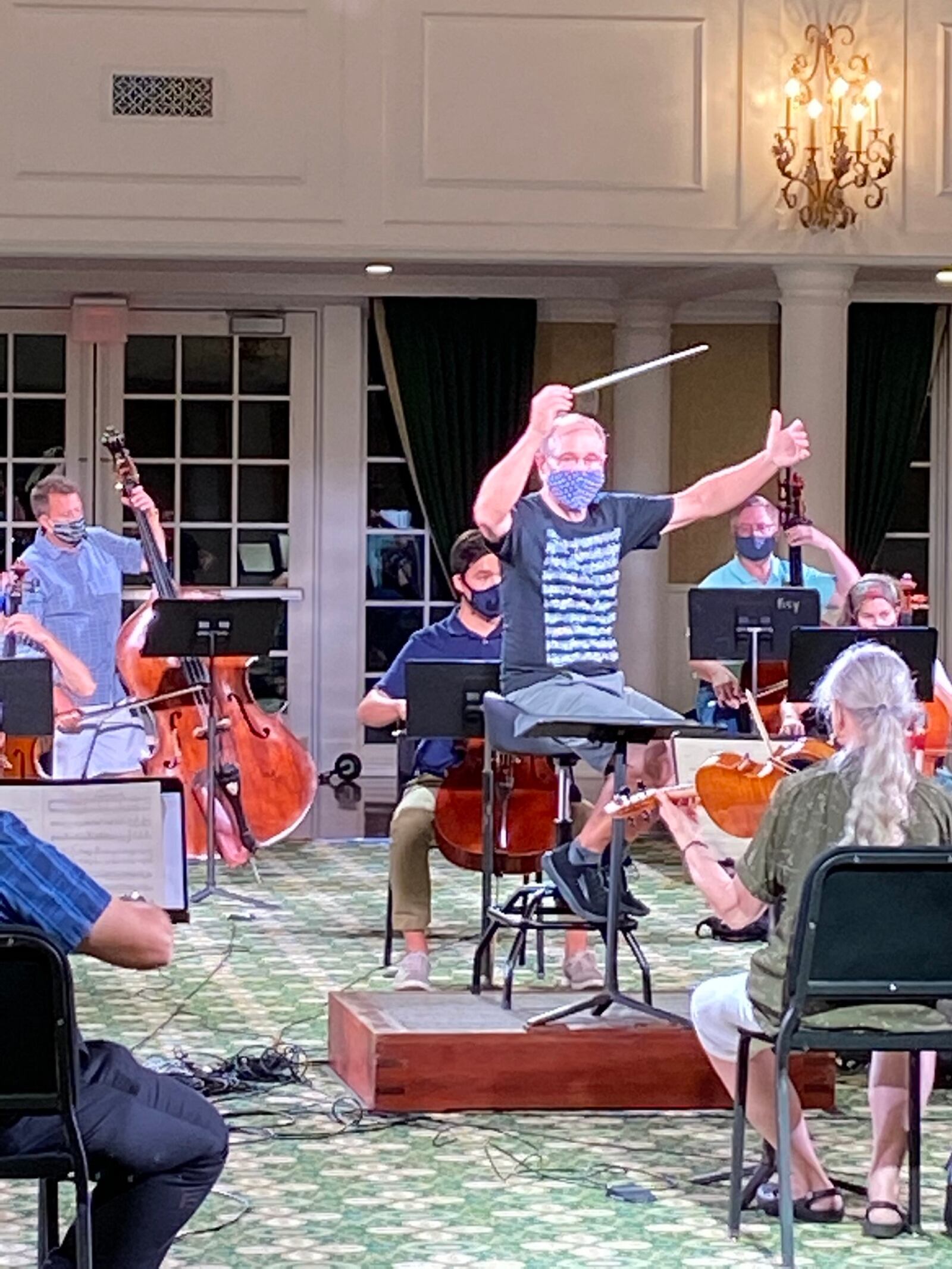 Maestro Neal Gittleman and musicians from the Dayton Philharmonic Orchestra rehearse Barber’s "Adagio for Strings" at Carillon Historical Park. CONTRIBUTED