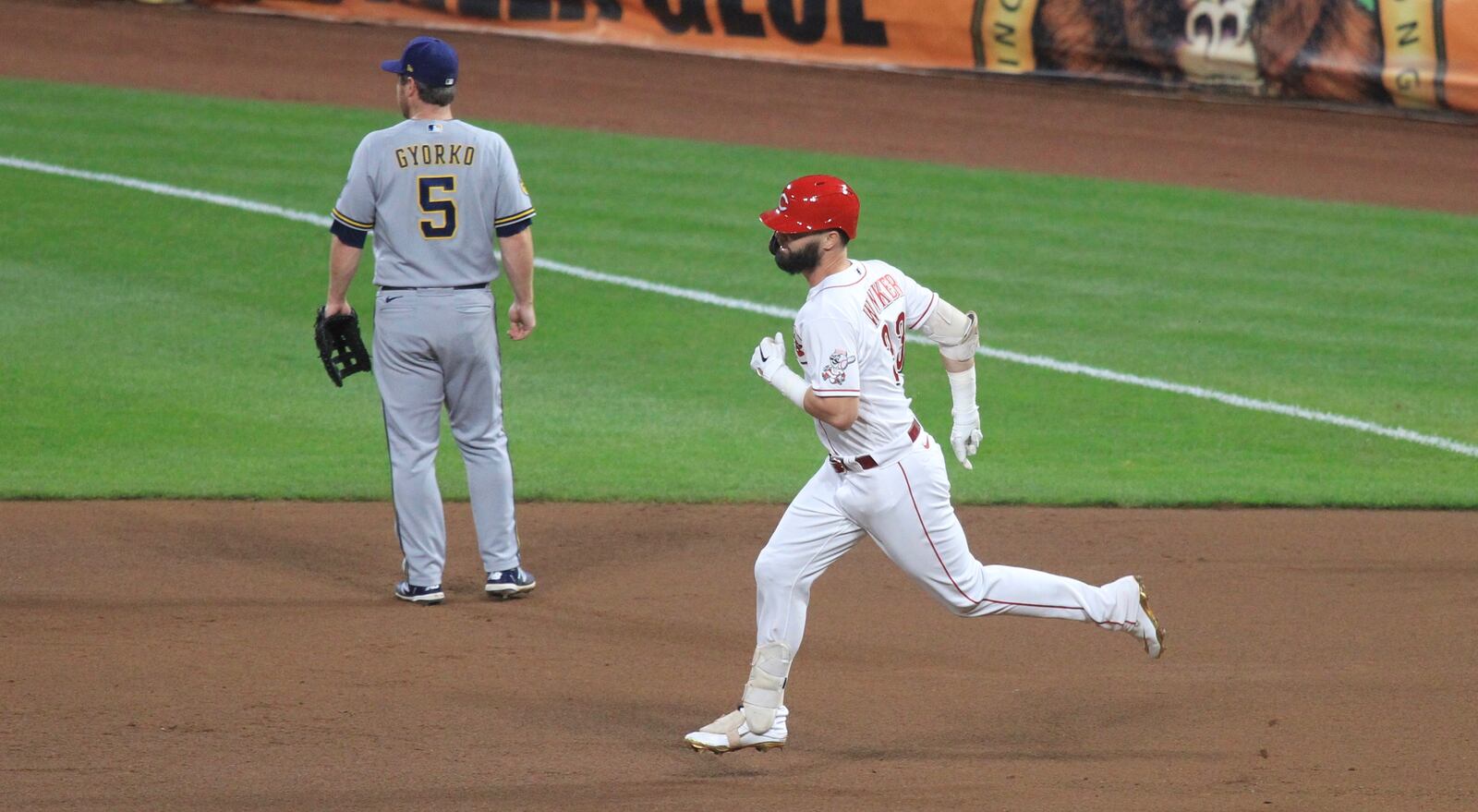 Jesse Winker, of the Reds, rounds the bases after hitting a home run against the Brewers on Wednesday, Sept. 23, 2020, at Great American Ball Park in Cincinnati. David Jablonski/Staff