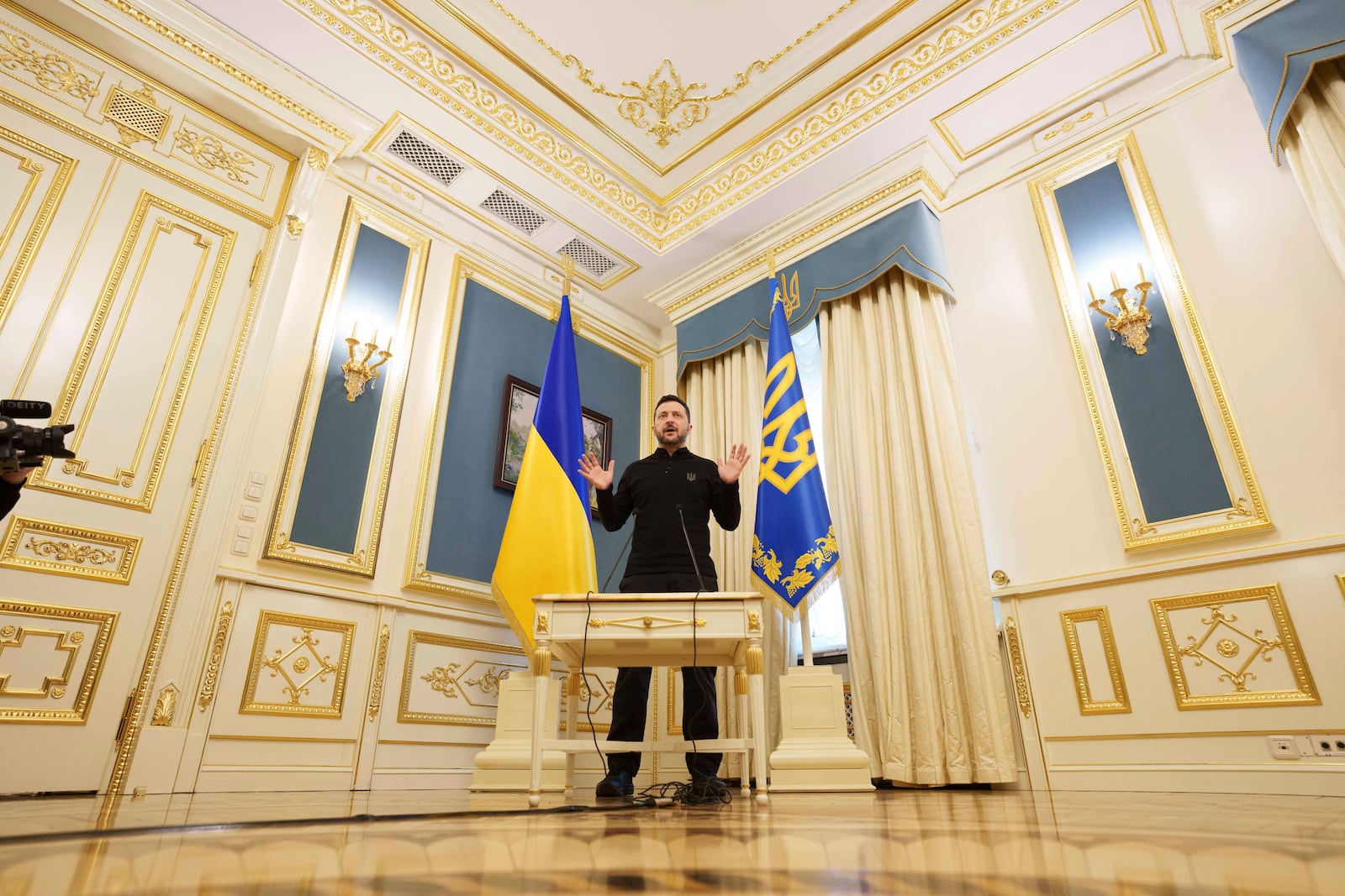 Ukrainian President Volodymyr Zelenskyy speaks to journalists during press conference in Kyiv, Ukraine, Wednesday, Feb. 26, 2025. (AP Photo/Evgeniy Maloletka)